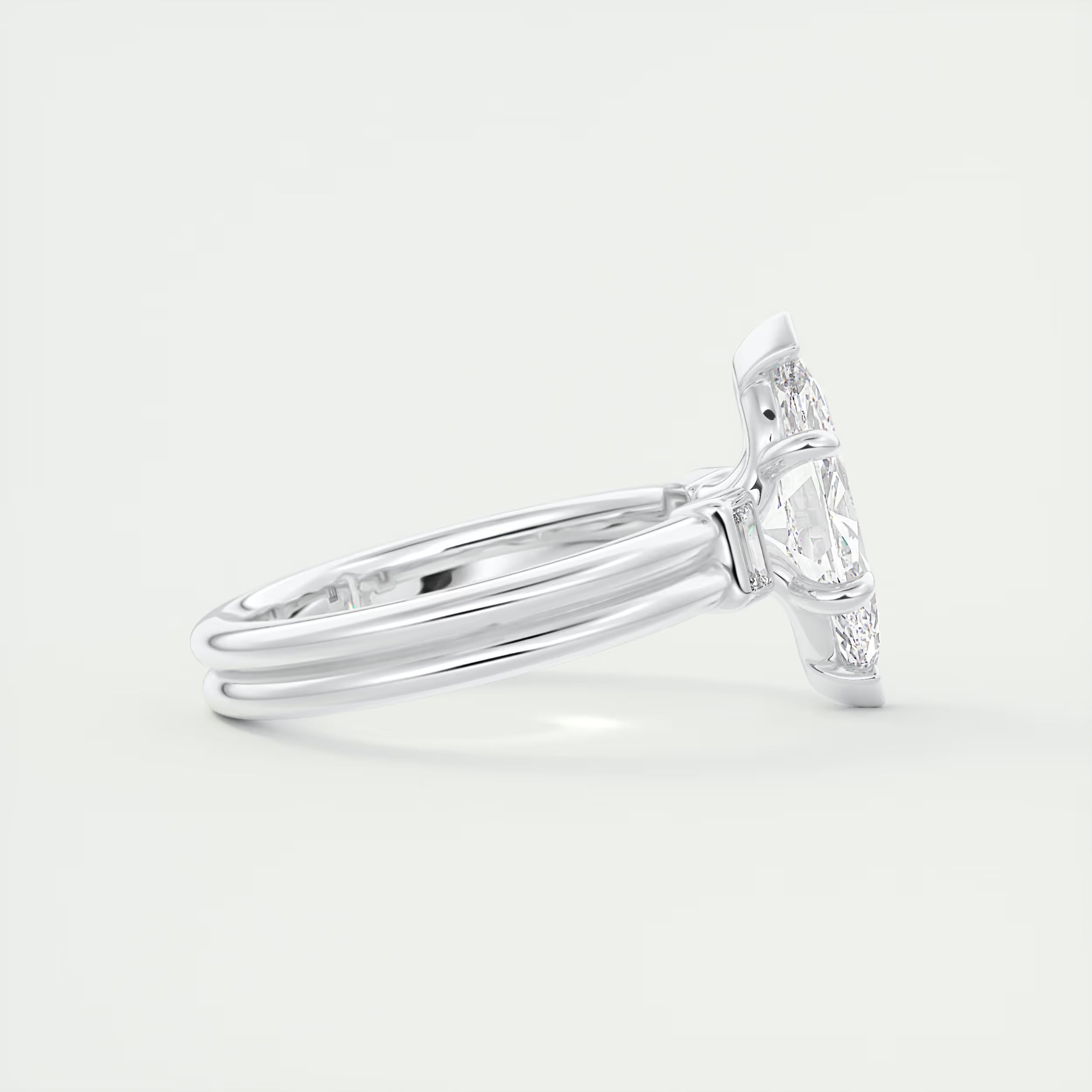 2.10 Ct The Center Stone Marquise & Side Stone Baguettes - Three Stone Engagement Rings