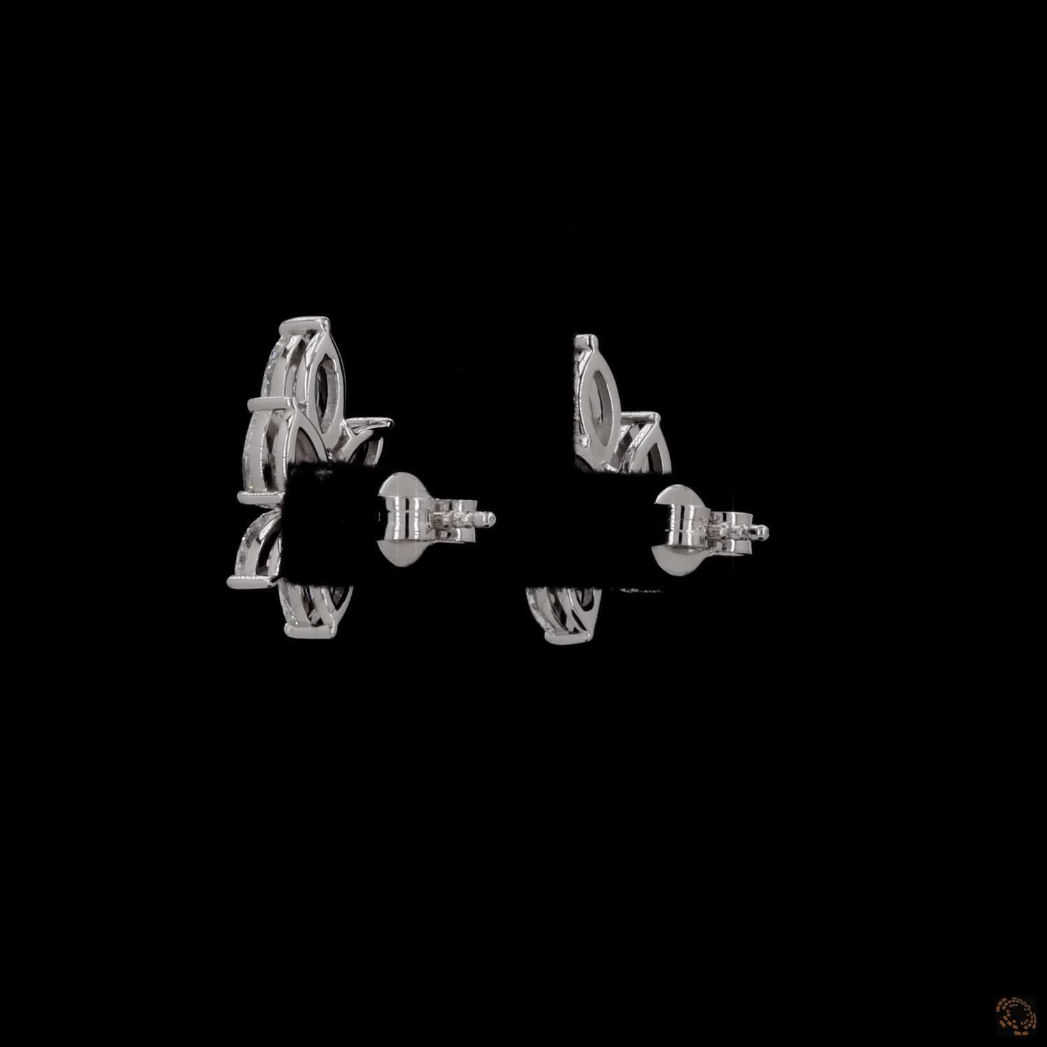 2.85 Ct High-brilliance marquise and pear cut diamonds set in shared-prong mountings