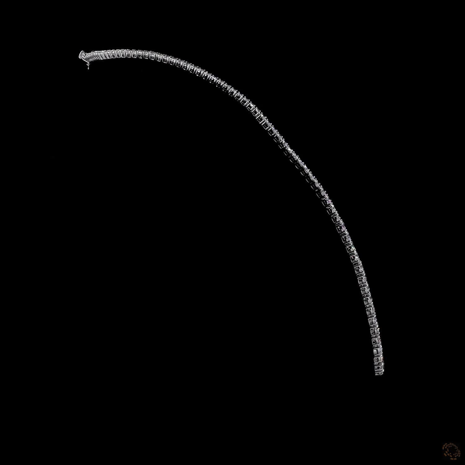 21.24 Ct Round Brilliant Cut diamonds arranged in a subtle, continuous graduated layout that tapers smoothly toward the back