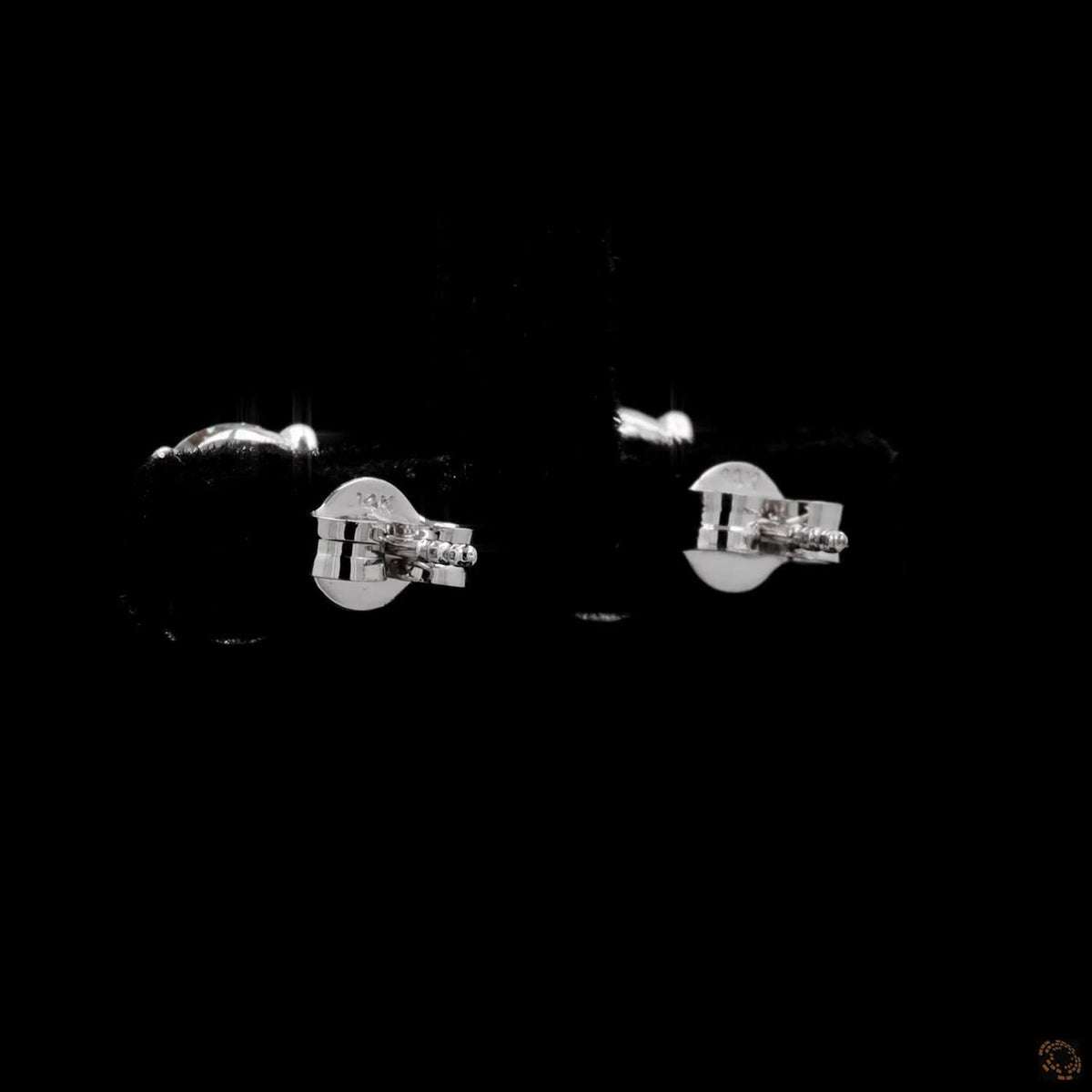 4.18 Ct Embrace quintessential elegance with these classic round brilliant-cut diamond solitaire stud earrings set in 14K white gold