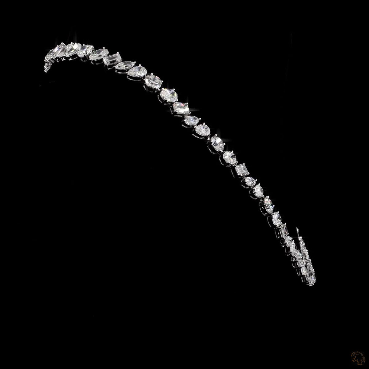 40.61 Ct High-clarity multi-shape diamonds, including round brilliant, oval, emerald, marquise, and pear cuts