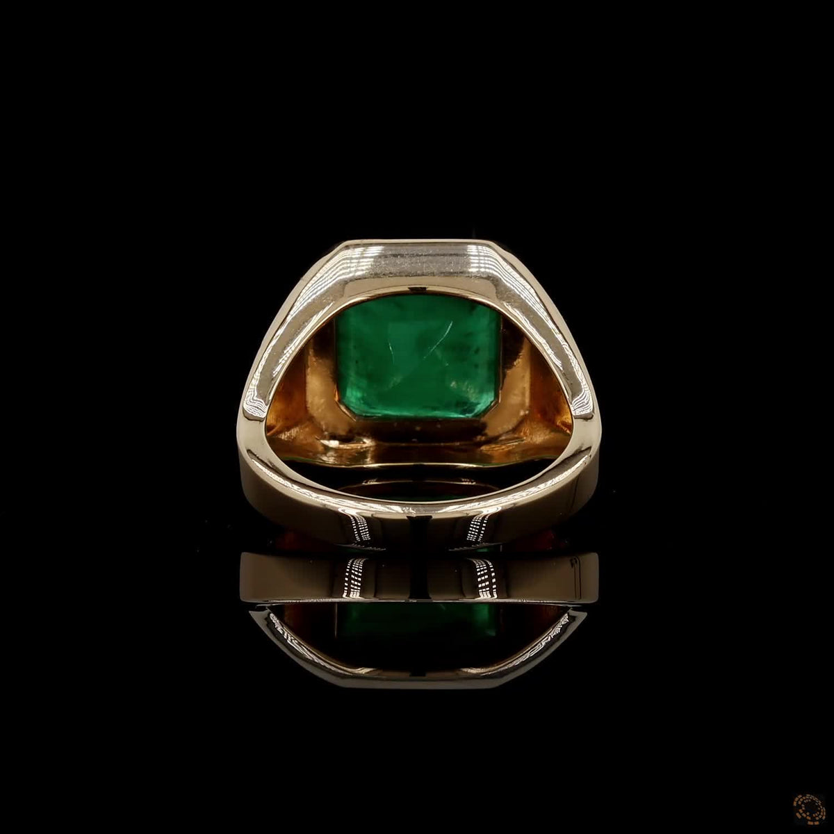4.23 Ct Vibrant green emerald-cut emerald showcasing rich natural inclusions and classic step-faceted clarity