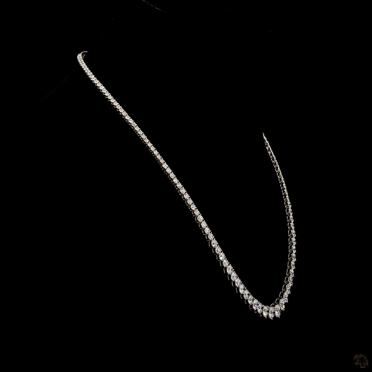 29.06 Ct Round Brilliant Cut diamonds seamlessly graduated from larger center stones