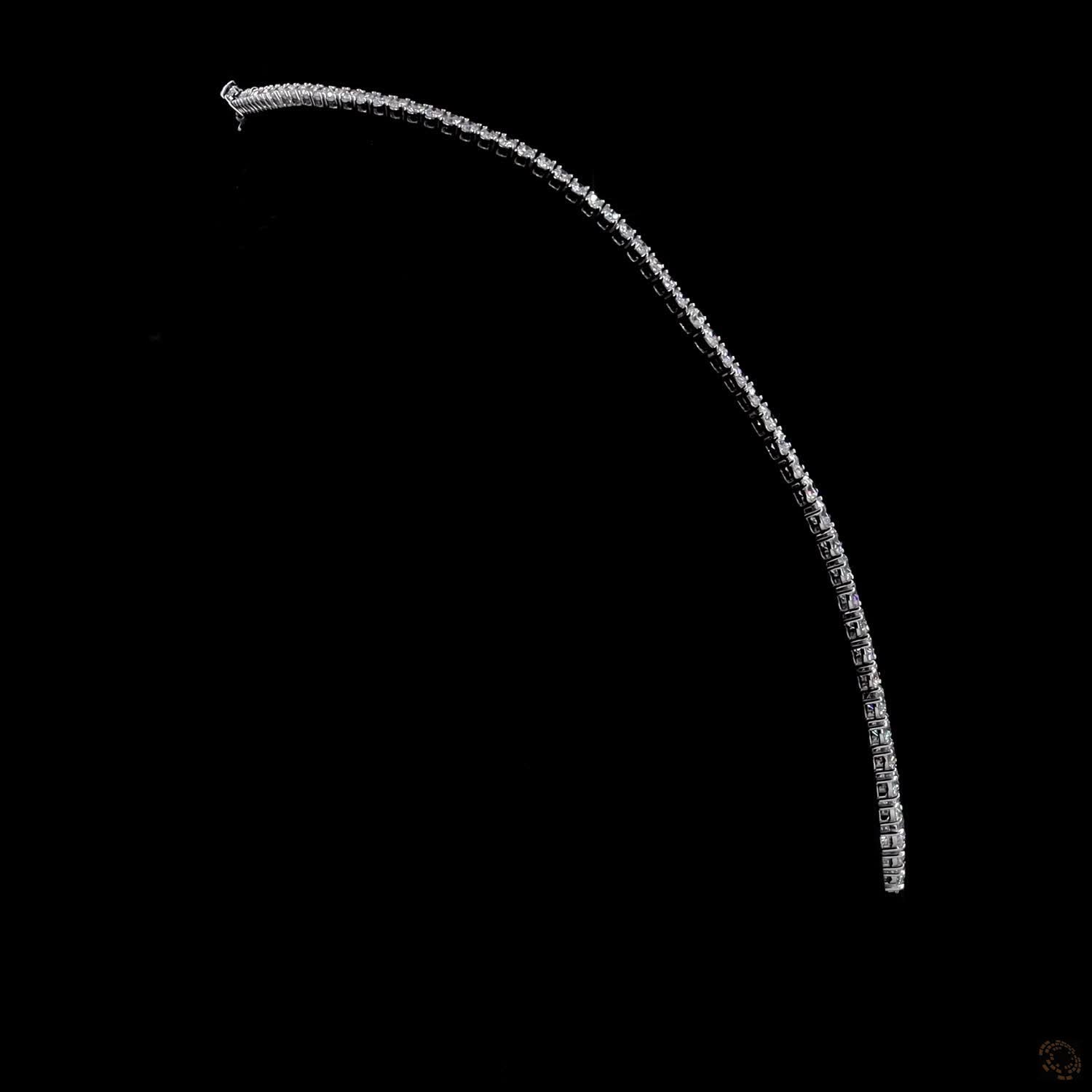 29.02 Ct Round Brilliant Cut diamonds seamlessly graduated from prominent center stones down to smaller accent stones toward the clasp