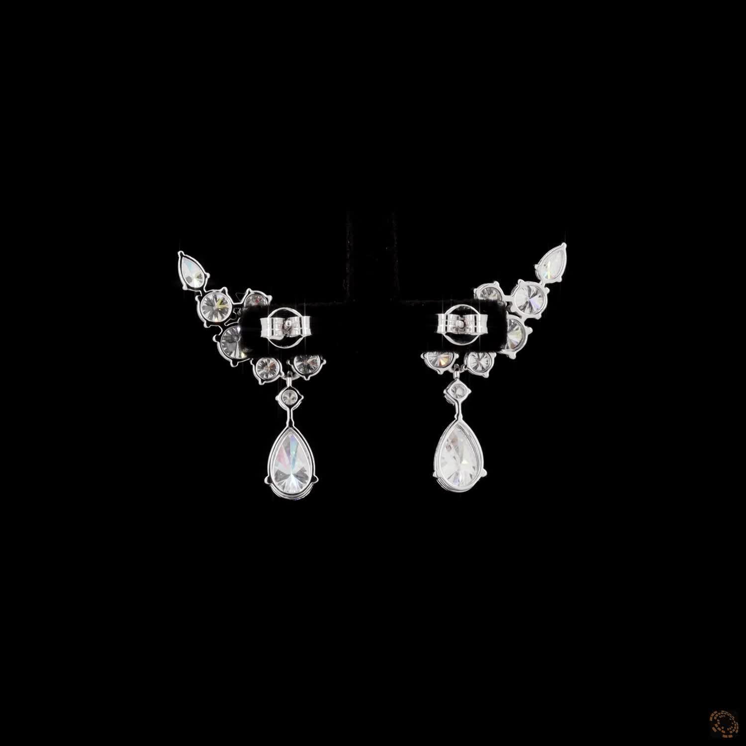 8.07 Pear and Round Diamond Winged Cluster Drop Earrings