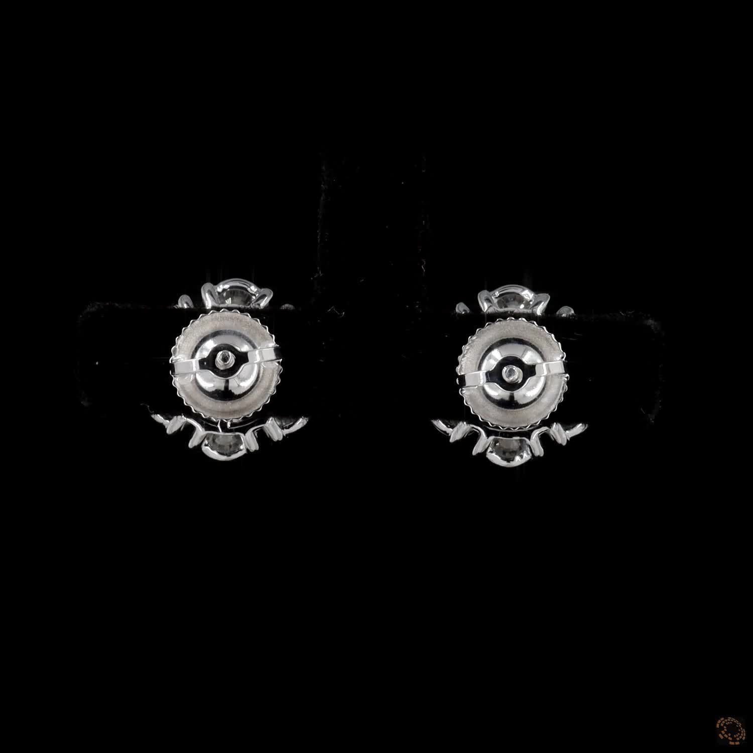 2.2 Ct Round Brilliant Cut Central diamond framed by a floral halo of round diamonds
