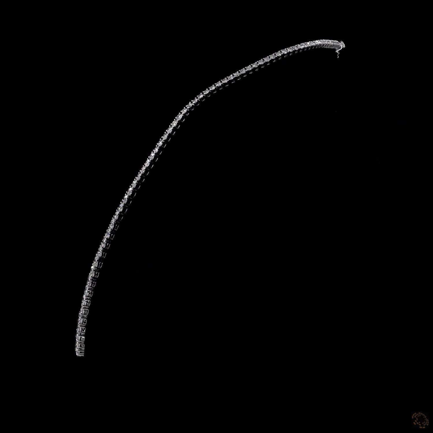 21.24 Ct Round Brilliant Cut diamonds arranged in a subtle, continuous graduated layout that tapers smoothly toward the back