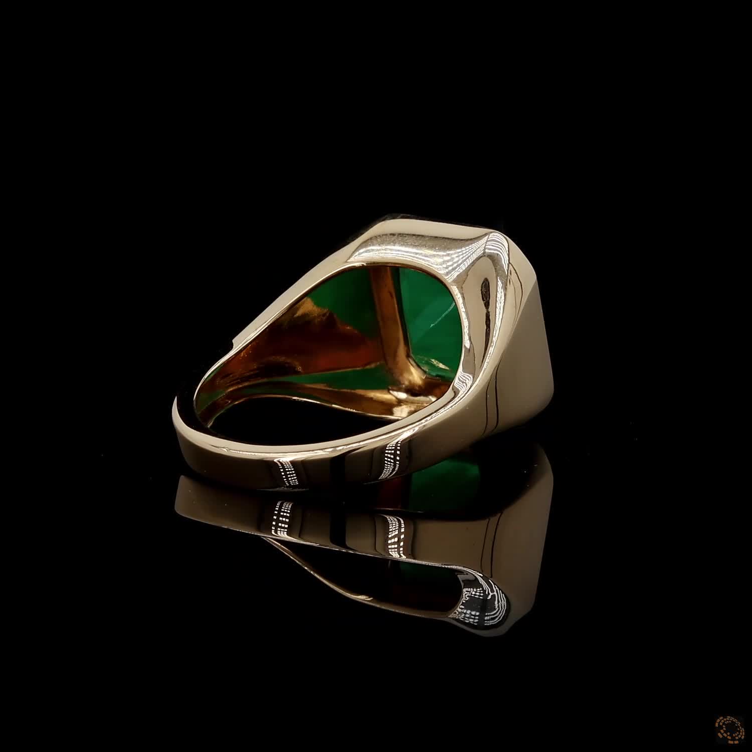 4.23 Ct Vibrant green emerald-cut emerald showcasing rich natural inclusions and classic step-faceted clarity