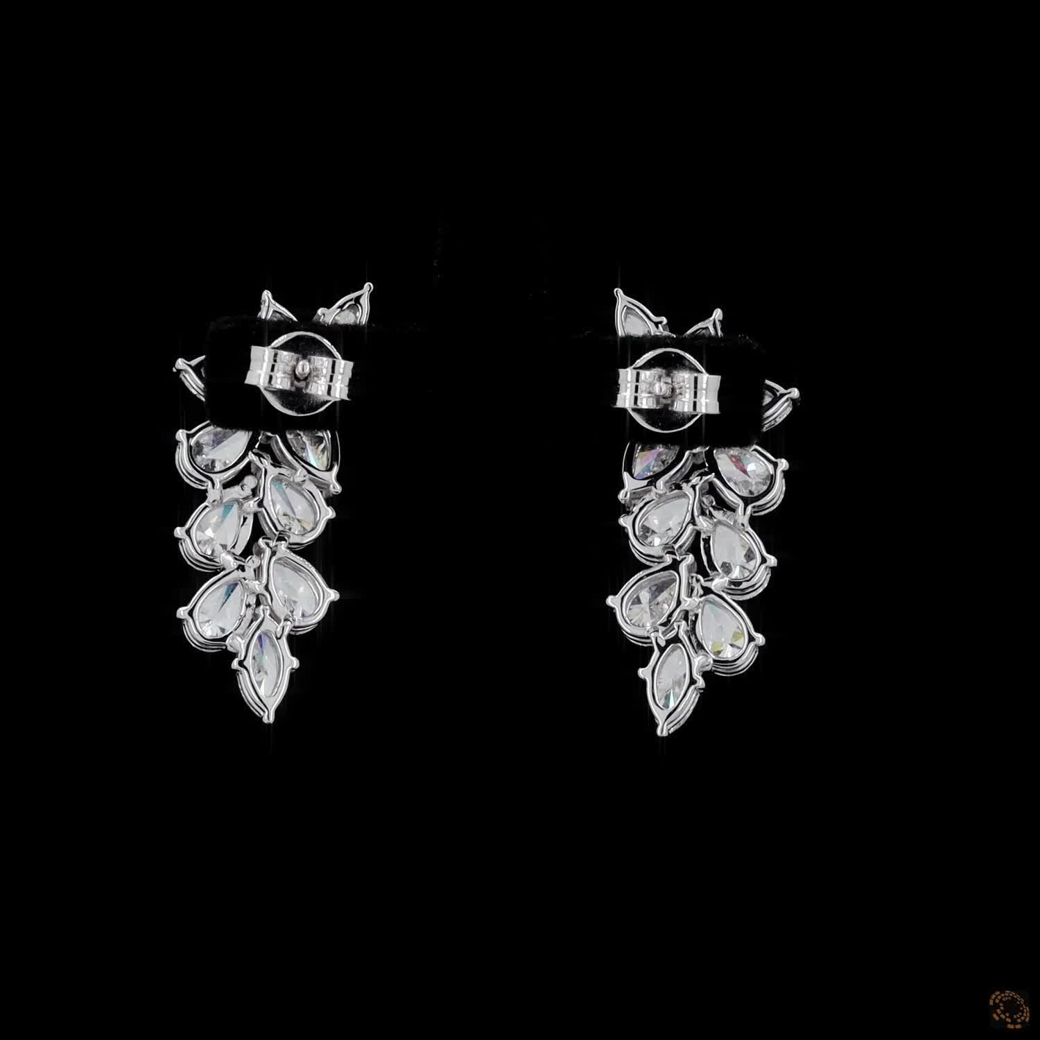 4.38 Ct High-clarity multi-shape diamonds marquise and pear cuts set at dynamic angles for multidirectional sparkle
