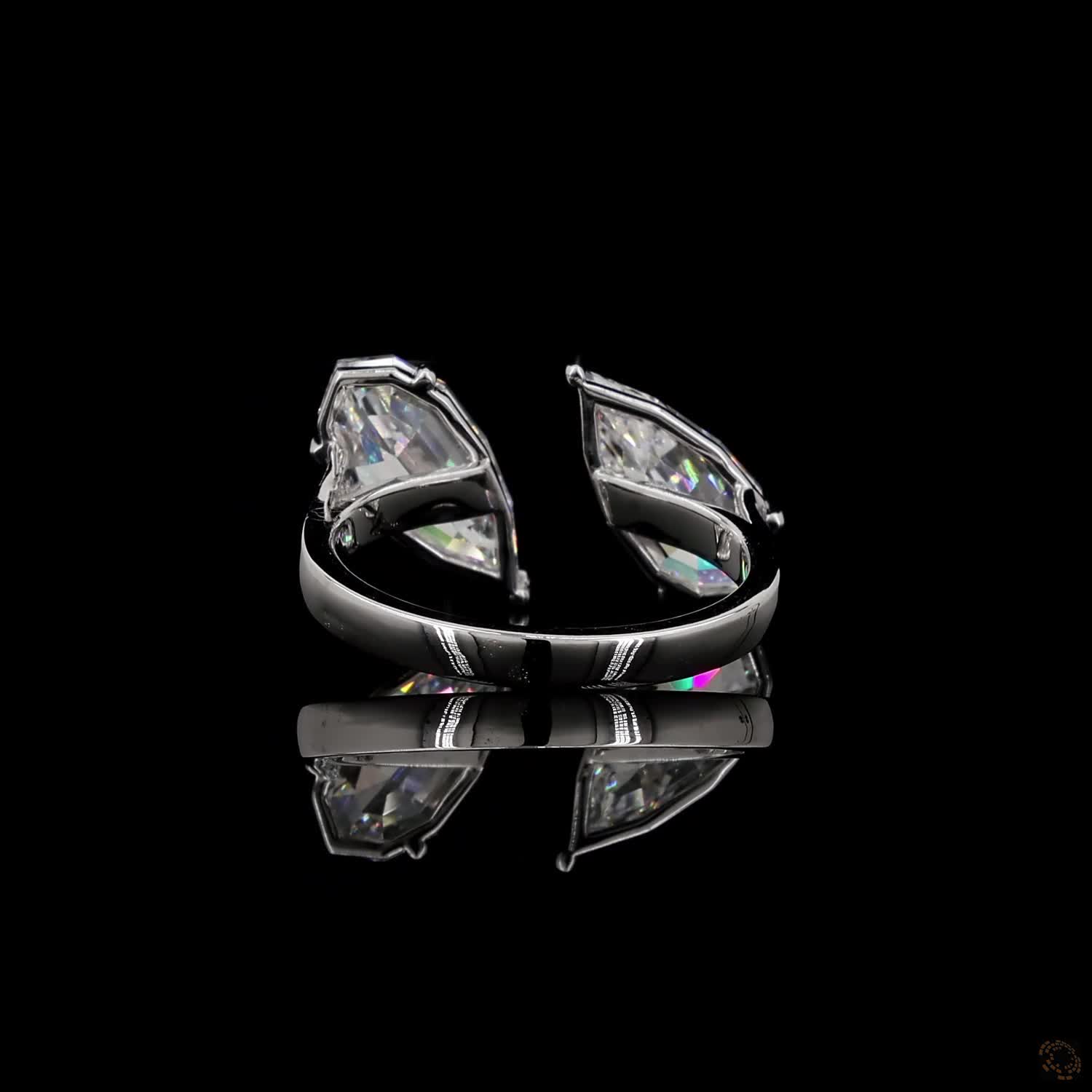 3.15 Ct Open cuff band with individually set basket prongs and protective V-prongs on the tips