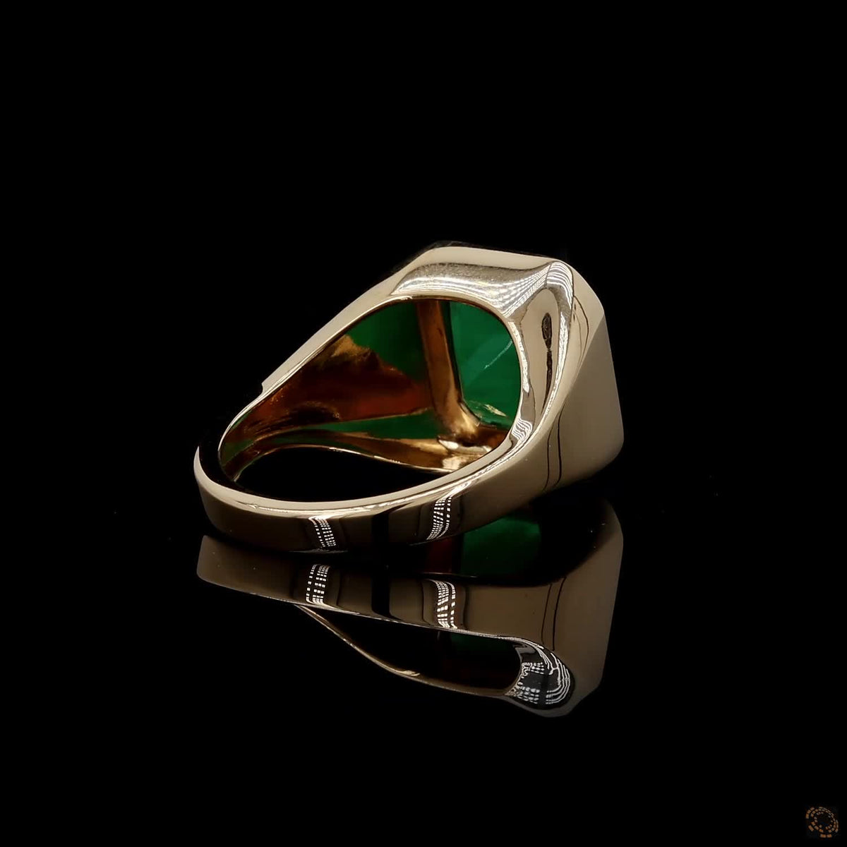 4.23 Ct Vibrant green emerald-cut emerald showcasing rich natural inclusions and classic step-faceted clarity