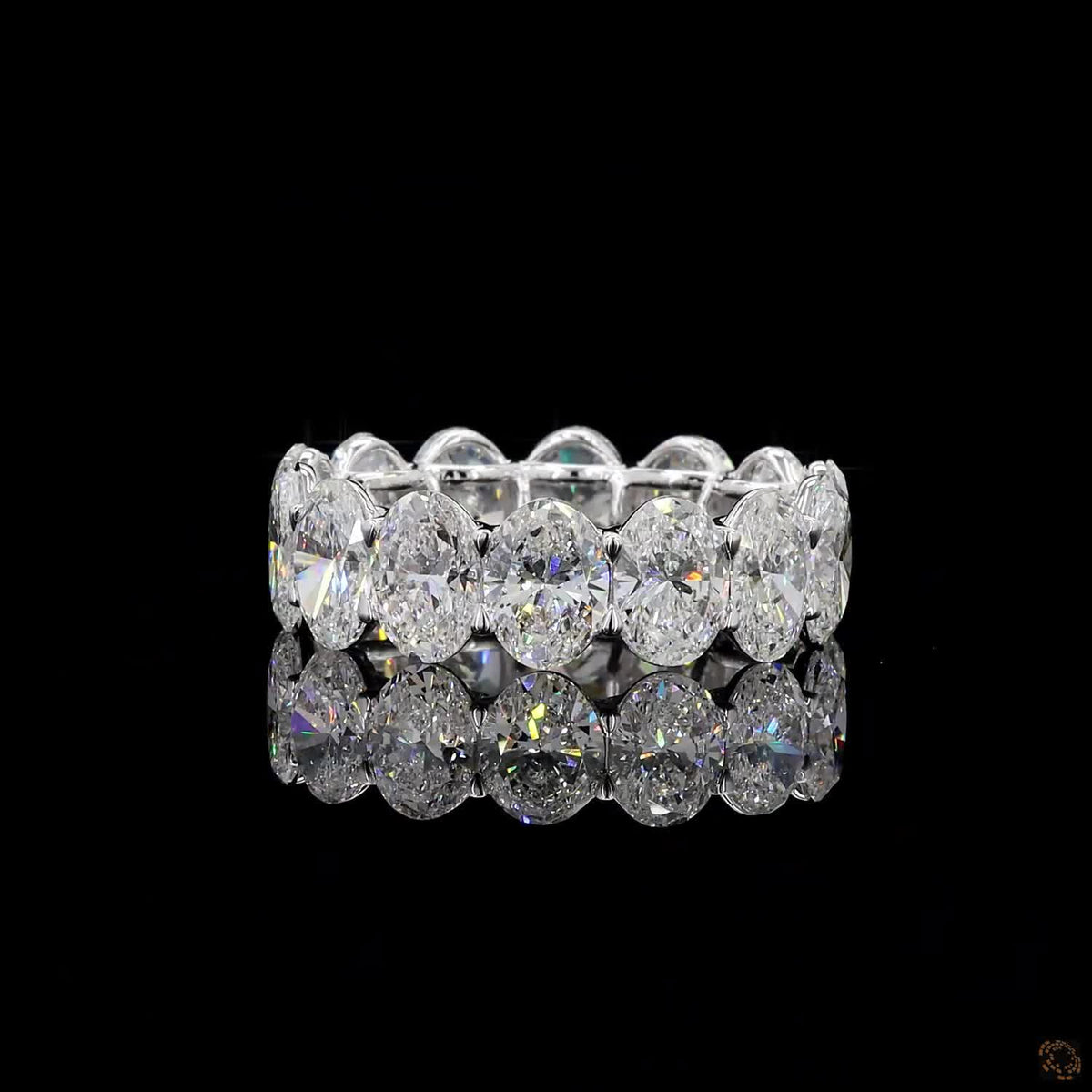 7.24 Ct Oval Cut Diamond Eternity Band set in white gold with vertically aligned oval stones