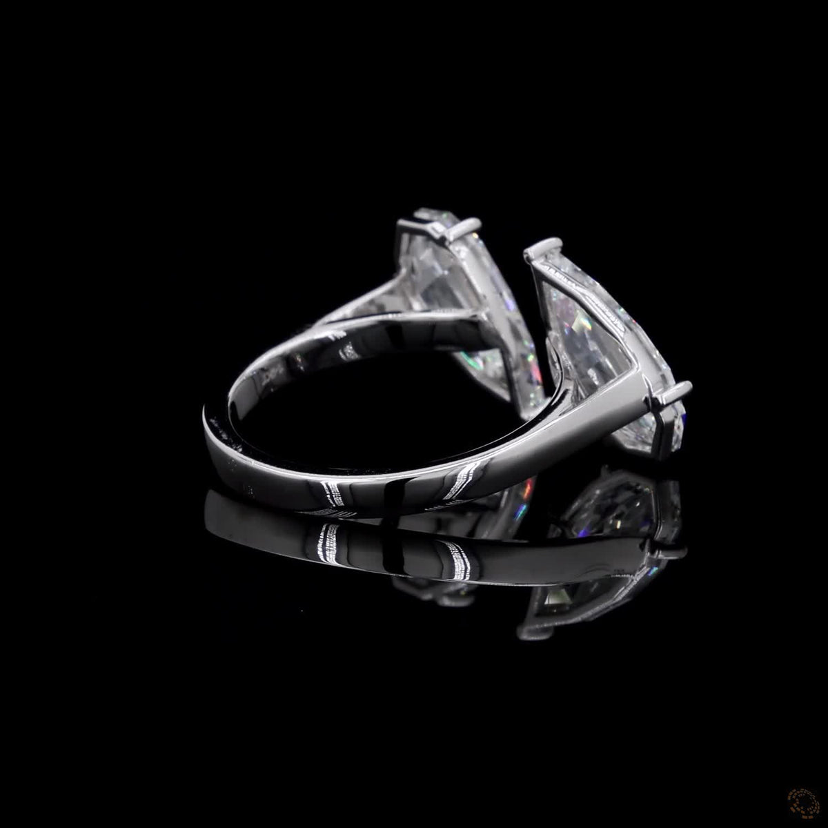 4.38 Ct Open cuff band with individually set basket prongs and protective V-prongs on the tips