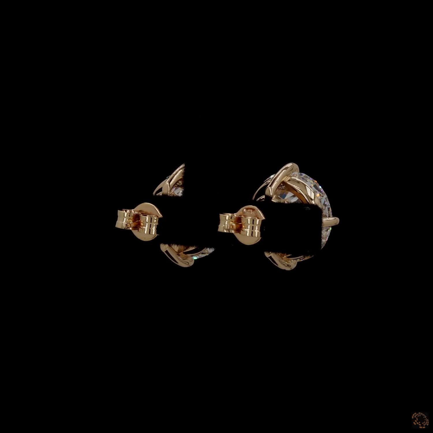 12.07 Ct Minimalist single-stone solitaire studs set in a delicate, architectural basket mount
