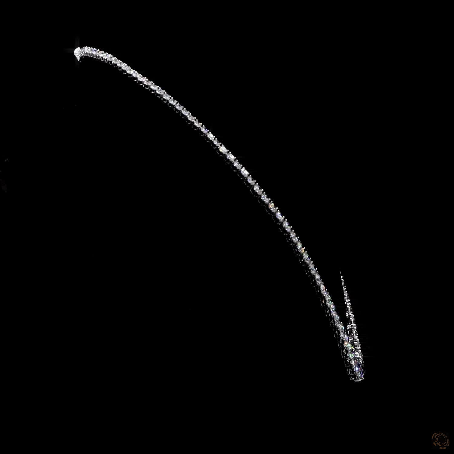 28.95 Ct Pair with a thin round-cut diamond choker higher on the neck to create a high-contrast, layered tennis necklace look