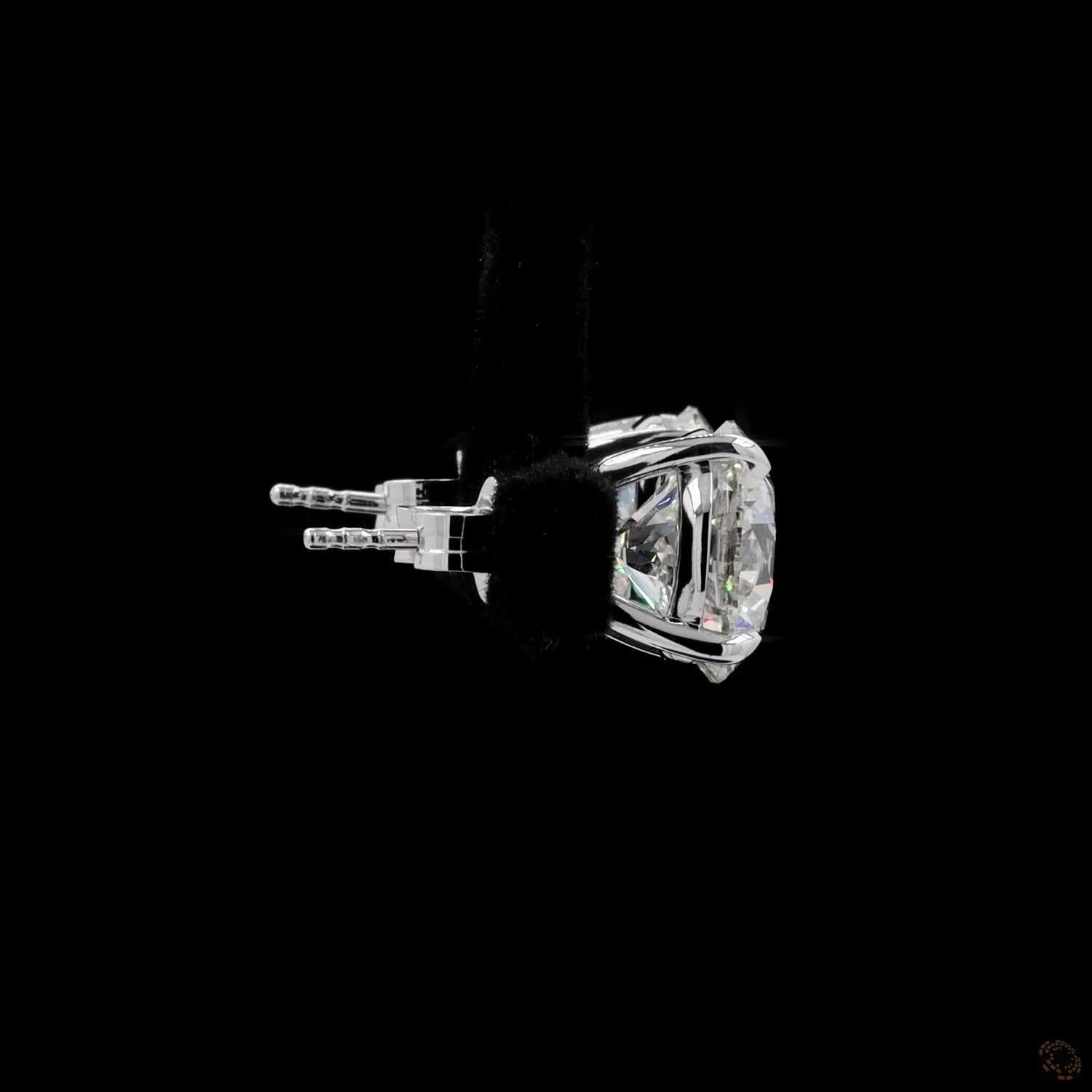 8.02 Ct A precise metal border fully encircles each diamond girdle, keeping the edges protected from bumps or chipping