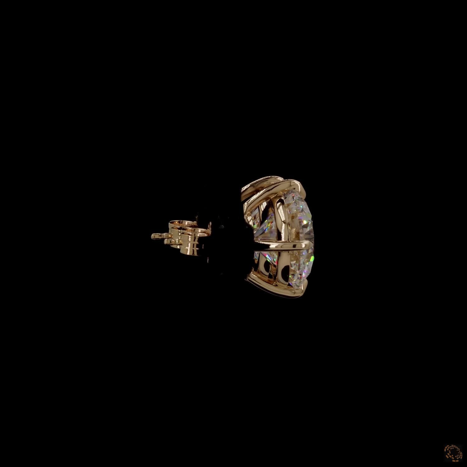 12.07 Ct Minimalist single-stone solitaire studs set in a delicate, architectural basket mount