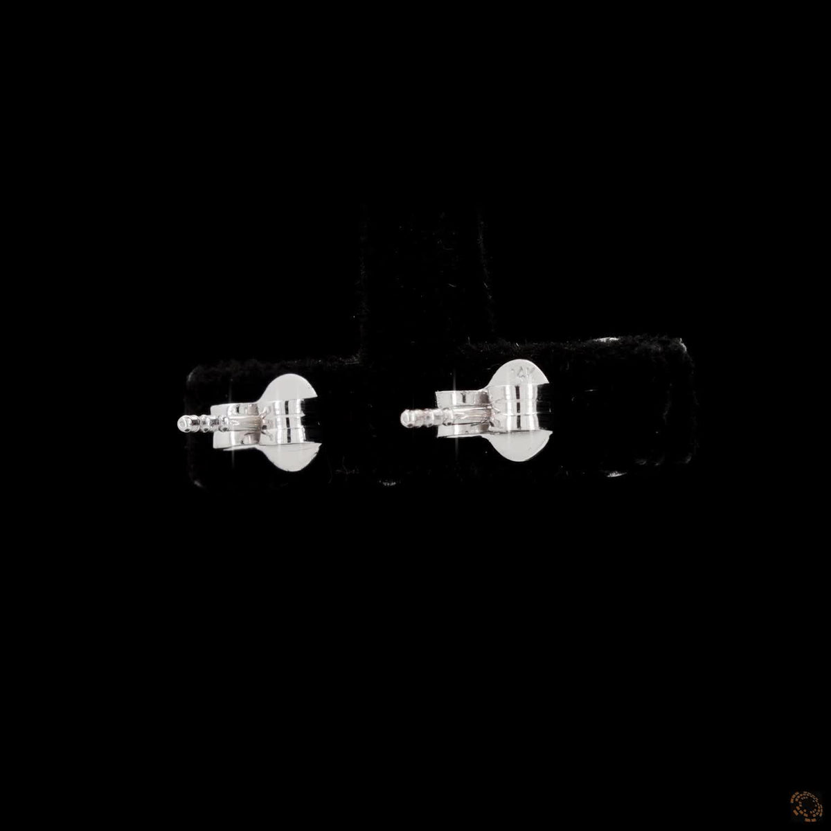 1.54 Ct Upgrade your jewelry wardrobe with sleek bezel-set solitaire diamond stud earrings in round brilliant crafted in 14K white gold with secure push backs