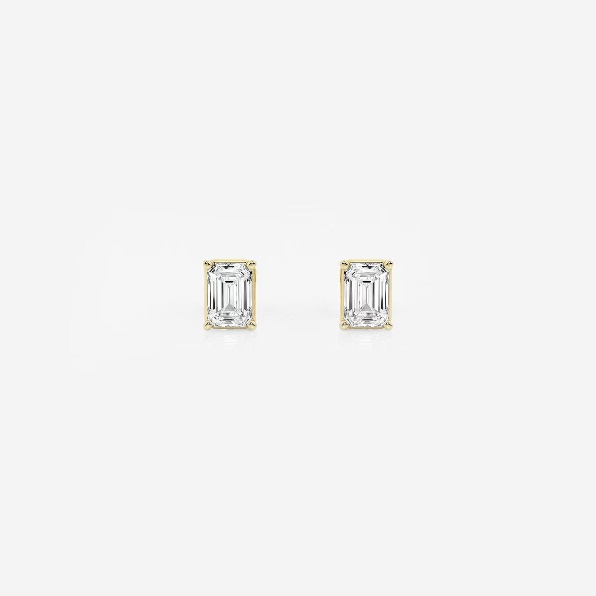 0.50 Ct Emerald Shap Near-Colorless 4-Prong Stud Earring