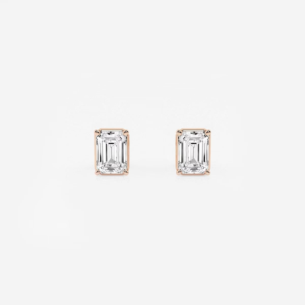 1.00 Ct Emerald Shap Near-Colorless 4-Prong Stud Earrings