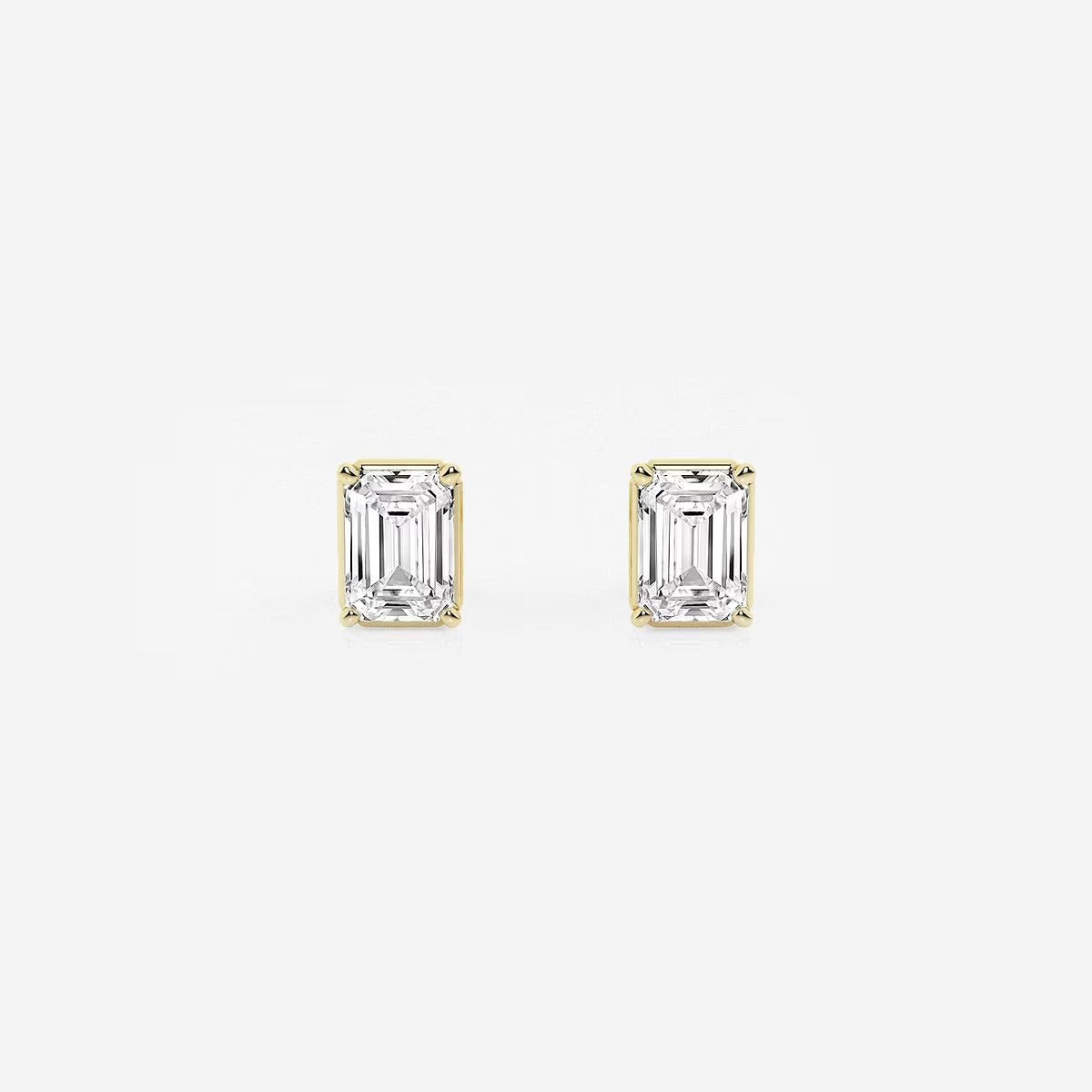 1.00 Ct Emerald Shap Near-Colorless 4-Prong Stud Earrings