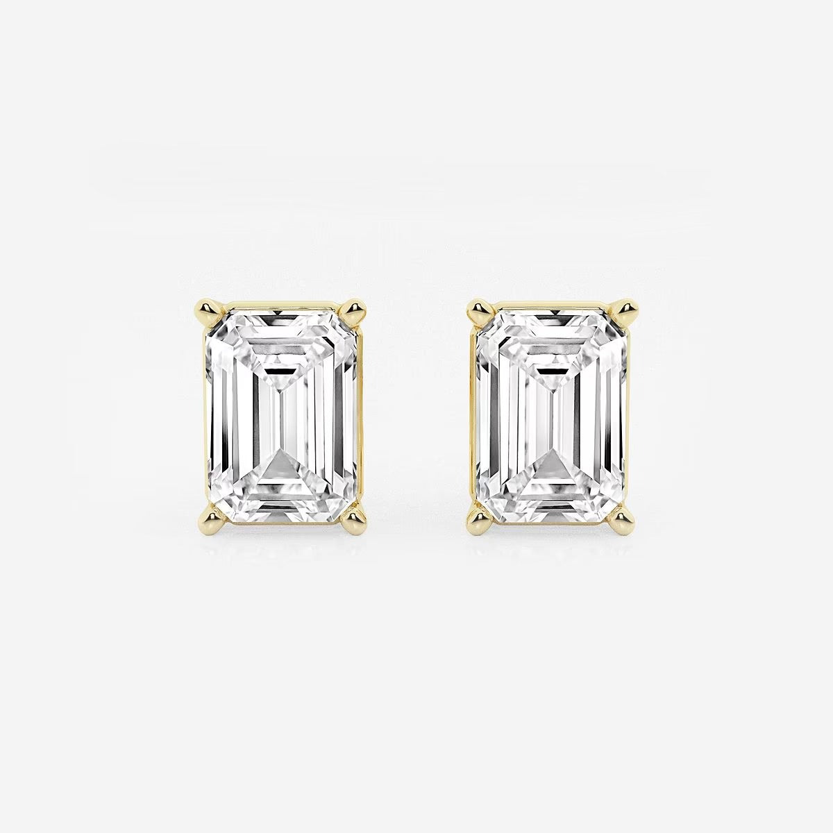 6.00 Ct Emerald Shap Near-Colorless 4-Prong Stud Earring