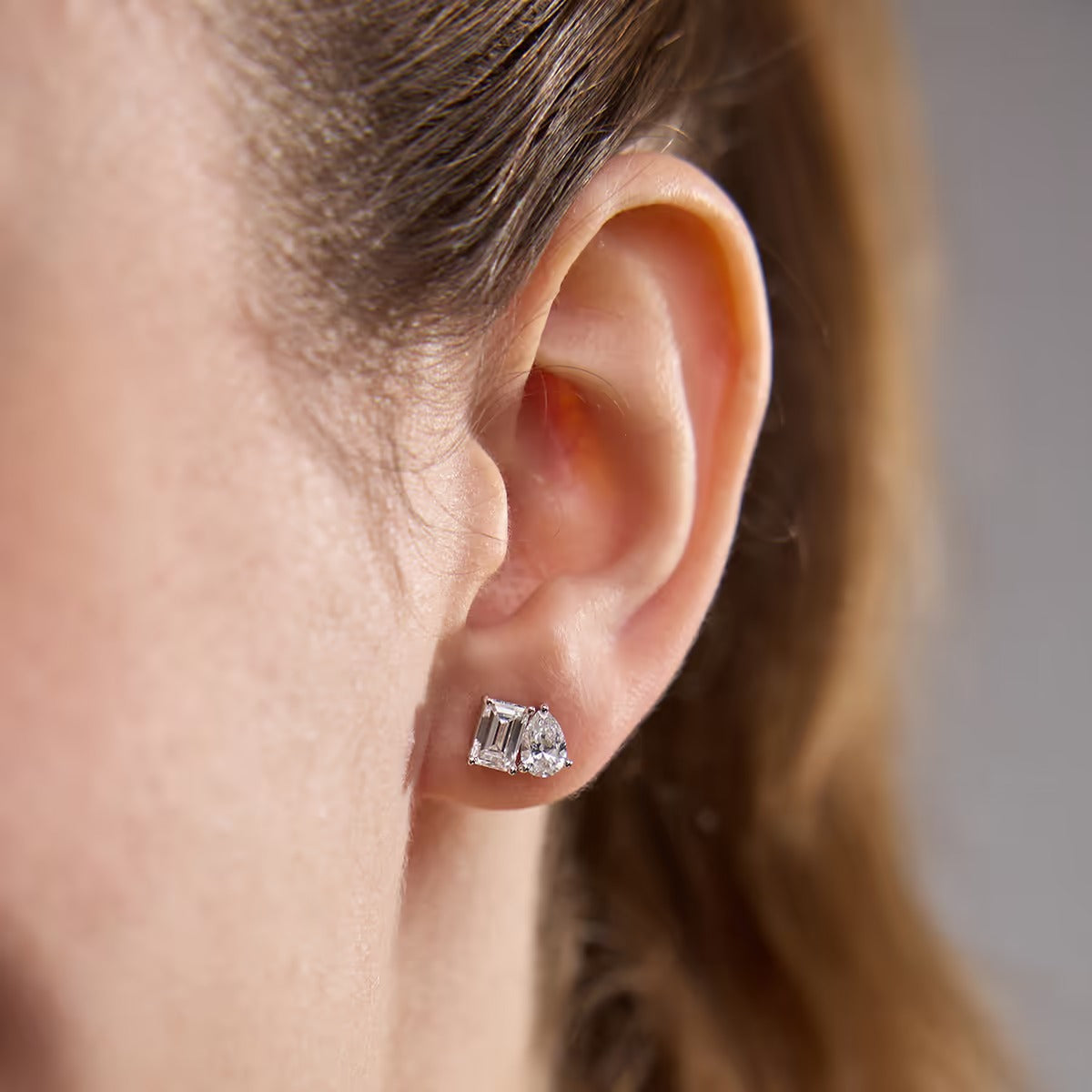 4.00 Ct Toi Et Moi Emerald and Pear Stud Earrings