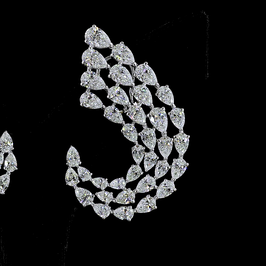 21.04 Cts 18K WHITE GOLD Pear Shape Crawler Earring