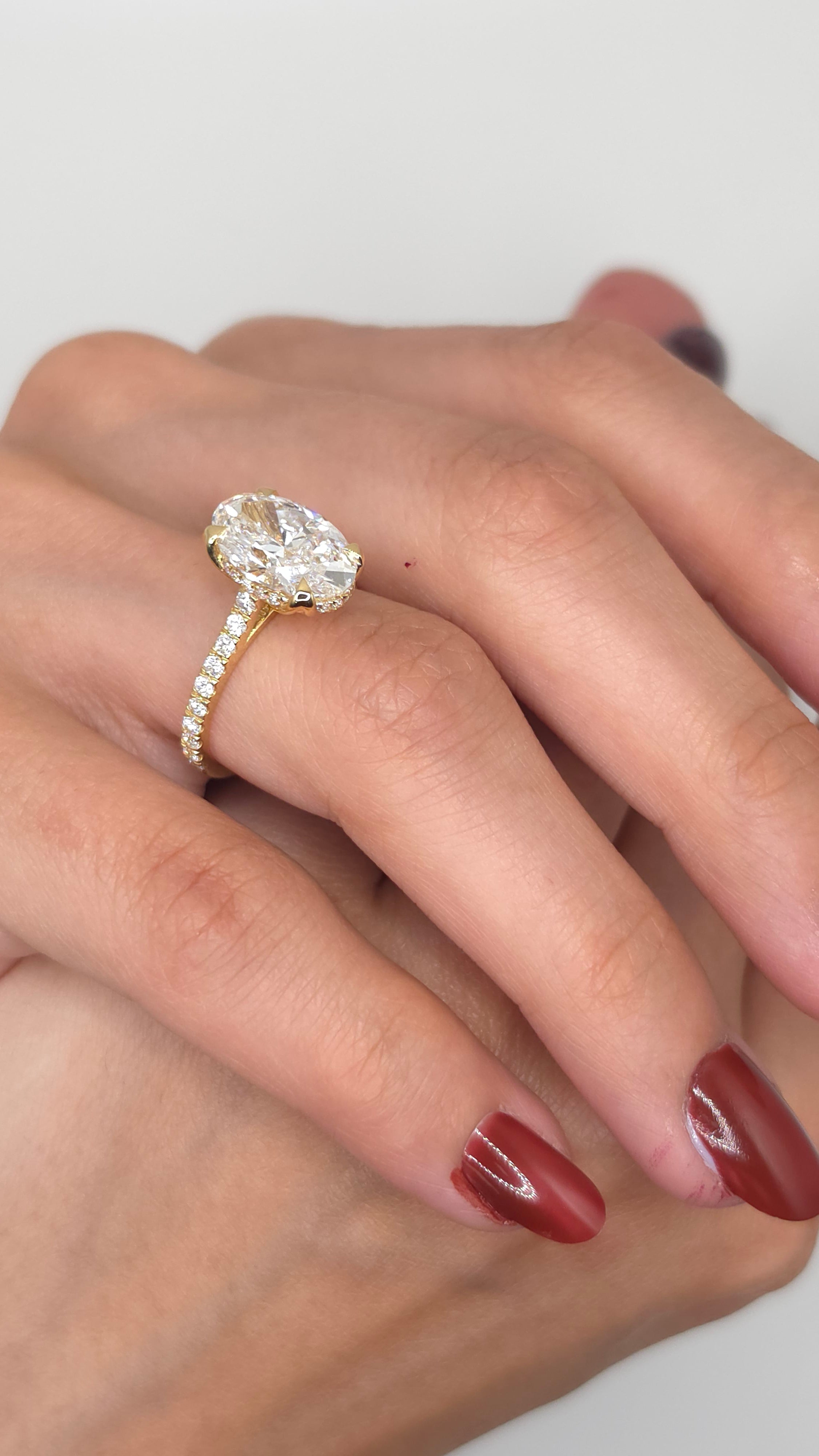 4.04 Ct Oval Cut Lab Grown Diamond Engagement Ring with Hidden Halo in Yellow Gold