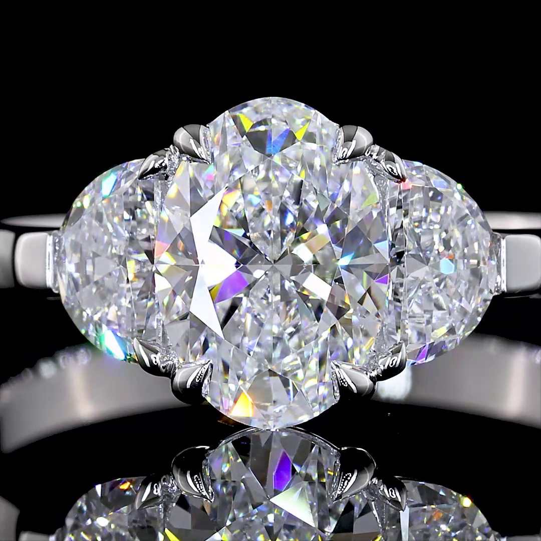 1.53 Ct Oval Cut Three Stone Diamond Engagement Ring with Half Moon Shape Diamond