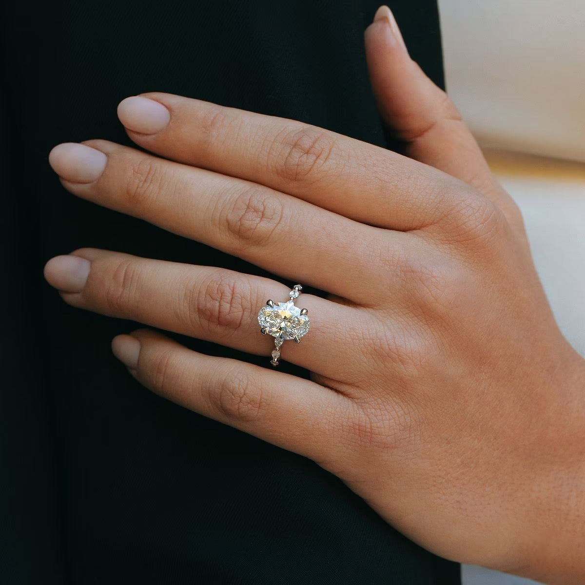 2.50 Ct Oval Lab Grown Diamond Engagement Ring with Floating Marquise Side Accents