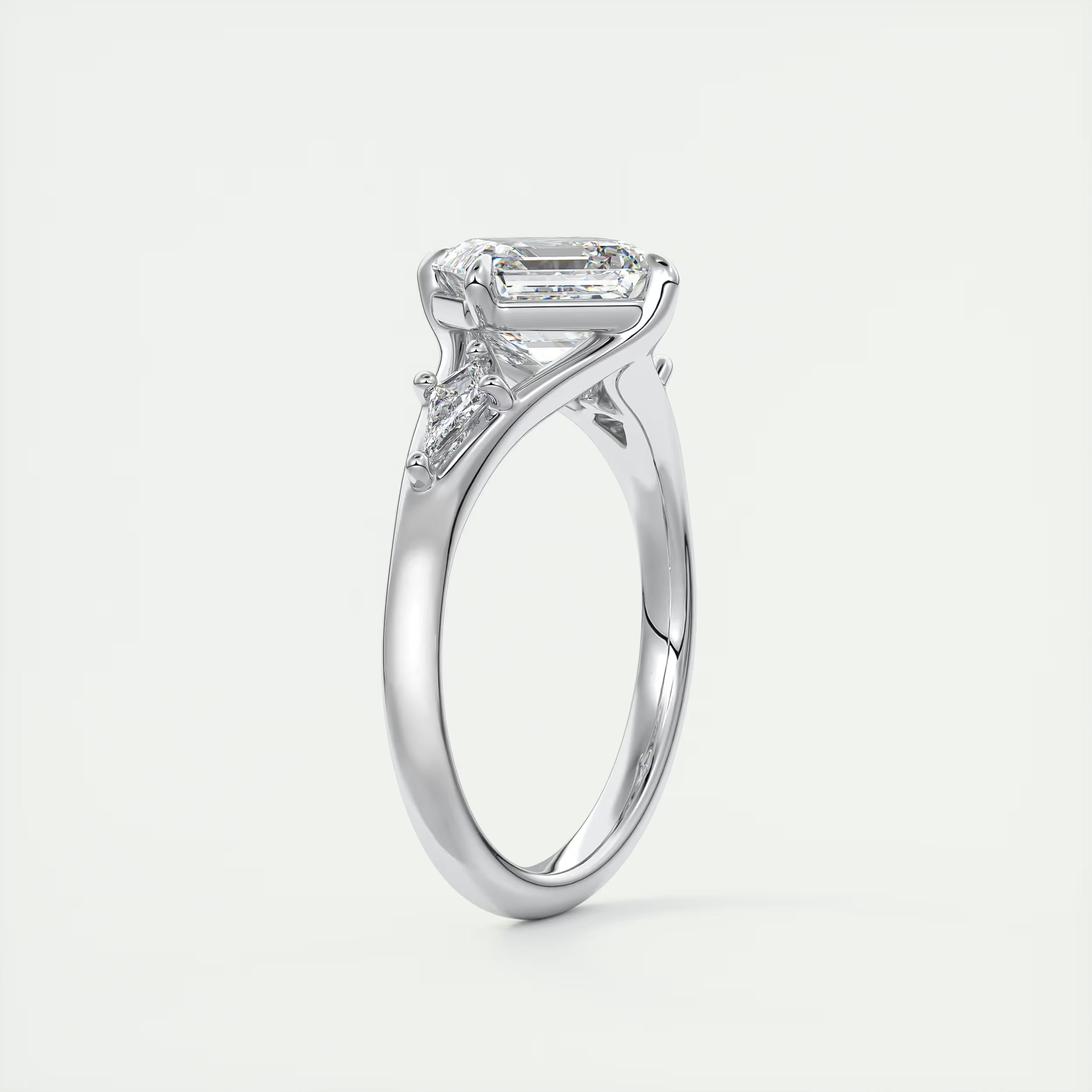3.00 Ct The Symphony Asscher & Side Stone Kites Split Shank Three Stone Engagement Rings