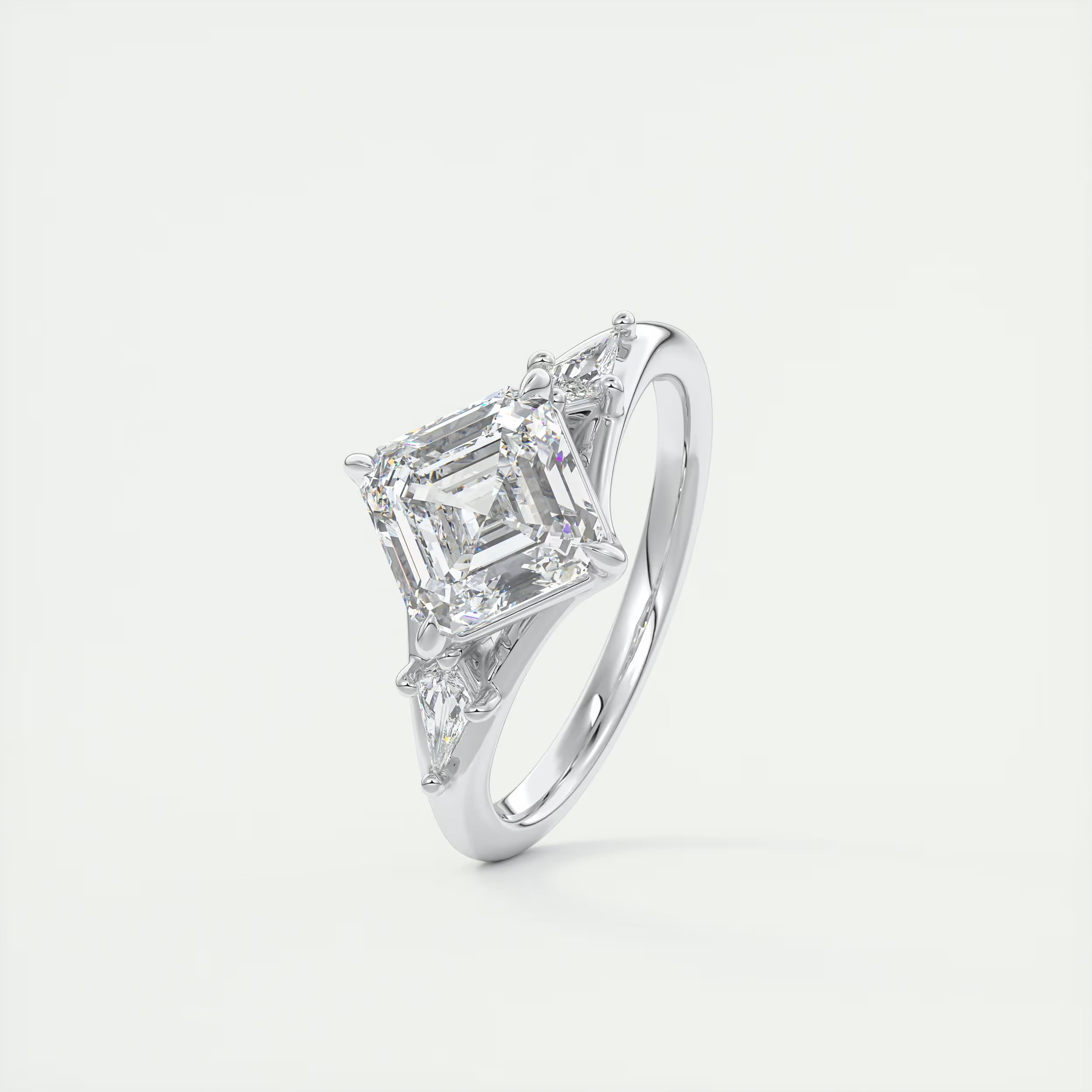 3.00 Ct The Symphony Asscher & Side Stone Kites Split Shank Three Stone Engagement Rings