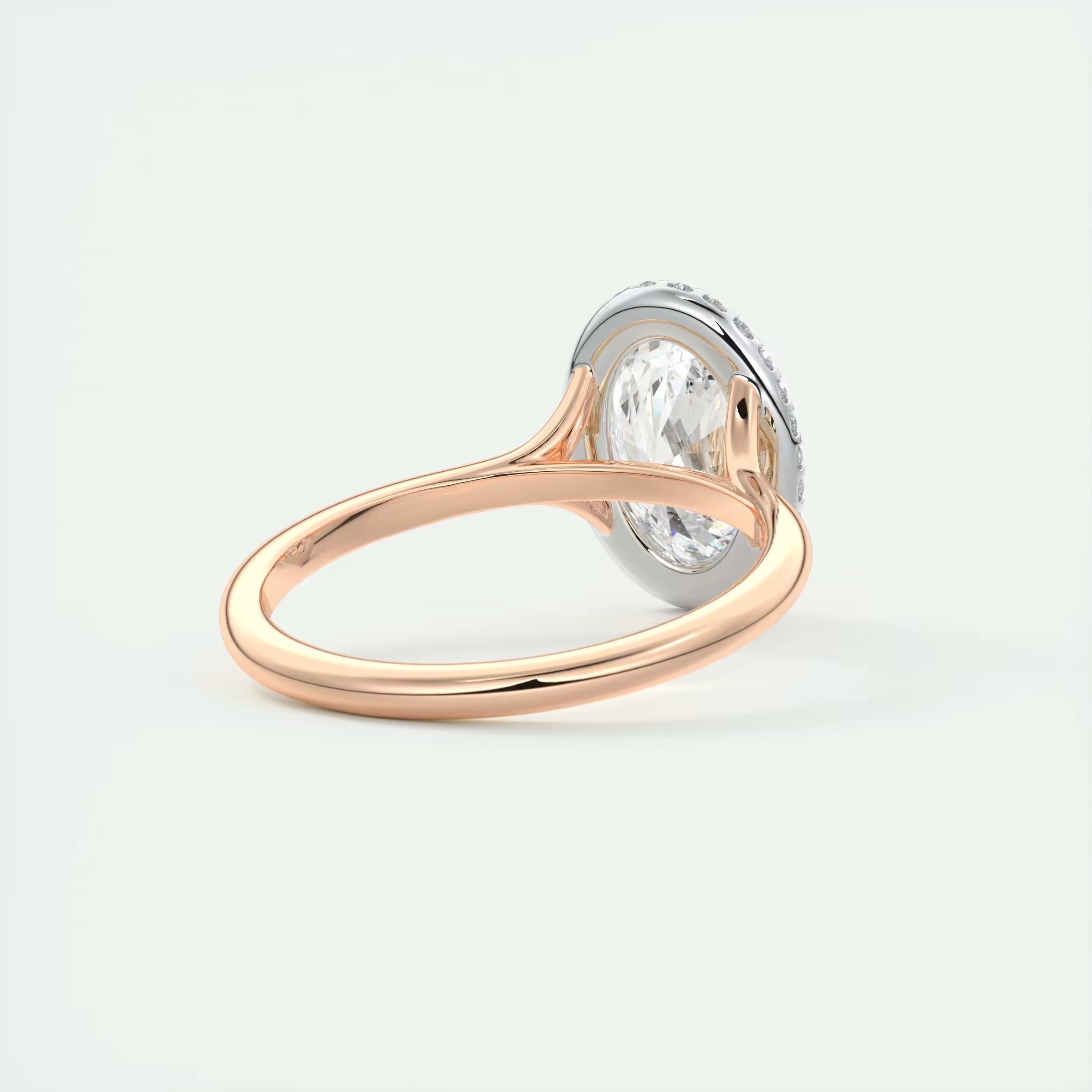 2.10 Ct The Breezy Halo Oval Center with French Set Halo Ring
