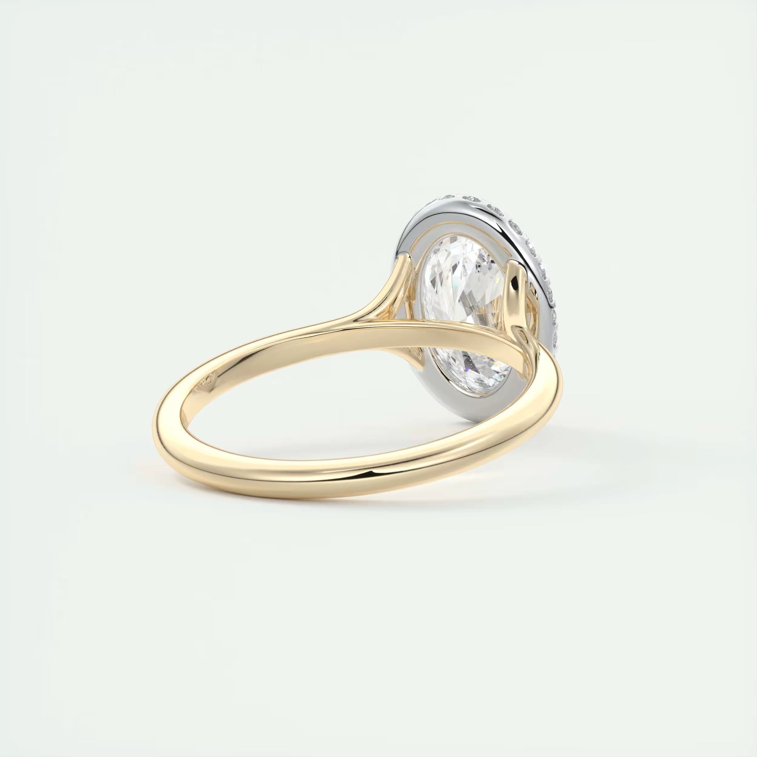 2.10 Ct The Breezy Halo Oval Center with French Set Halo Ring
