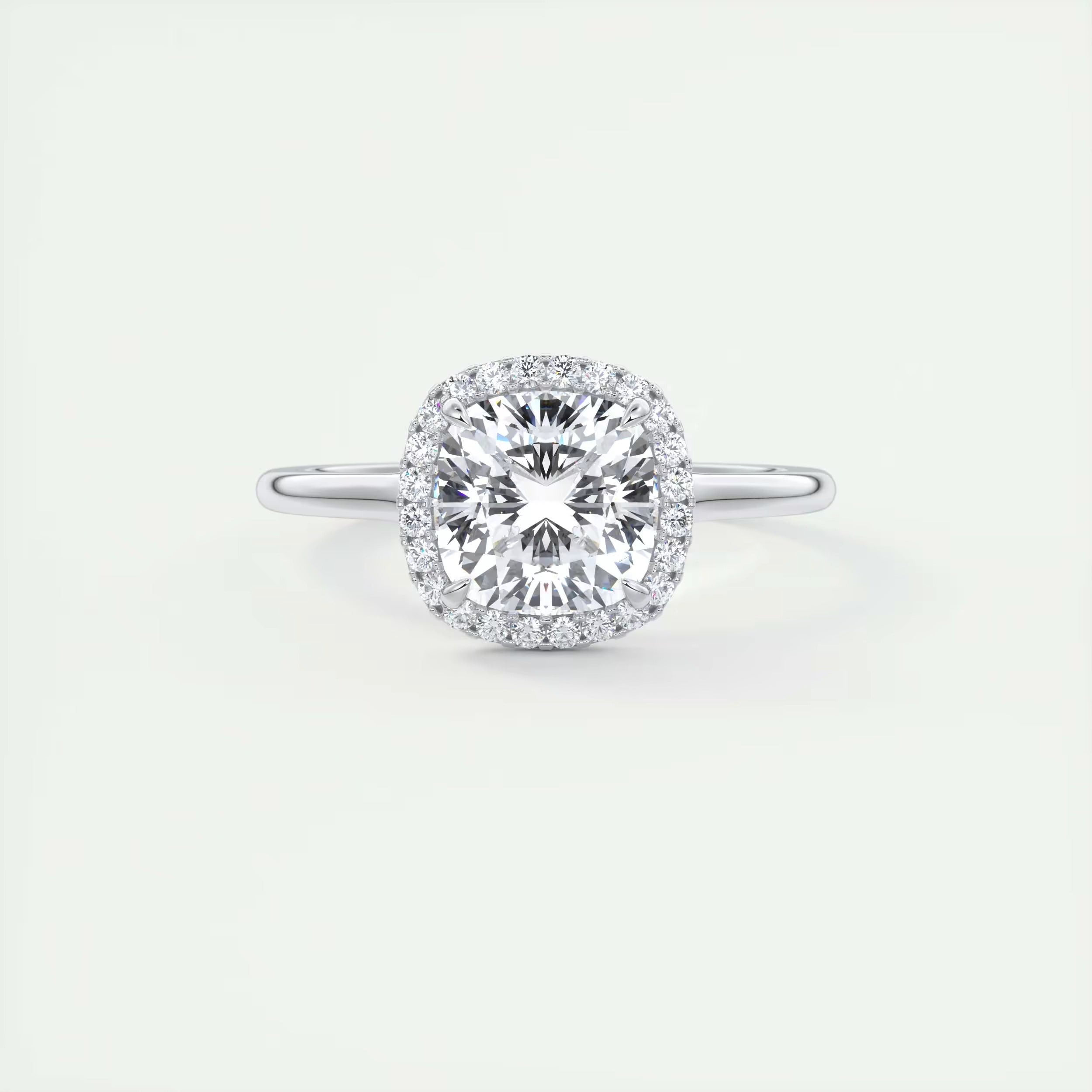 2.10 Ct The Breezy Halo Center Stone Cushion with French Set Halo Ring