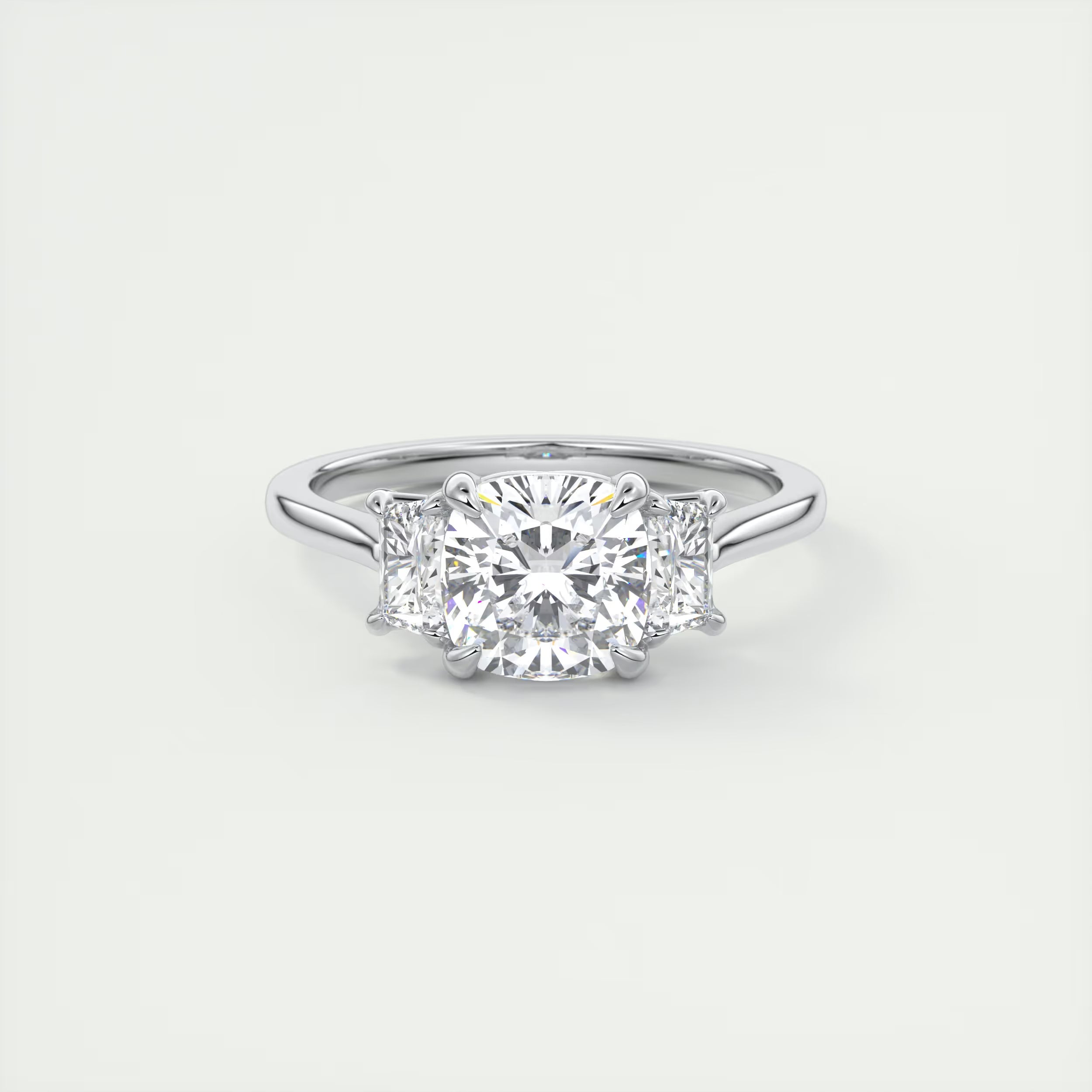 3.00 Ct Center Stone Cushion & Side Stone Trapezoid Three Stone Engagement Rings