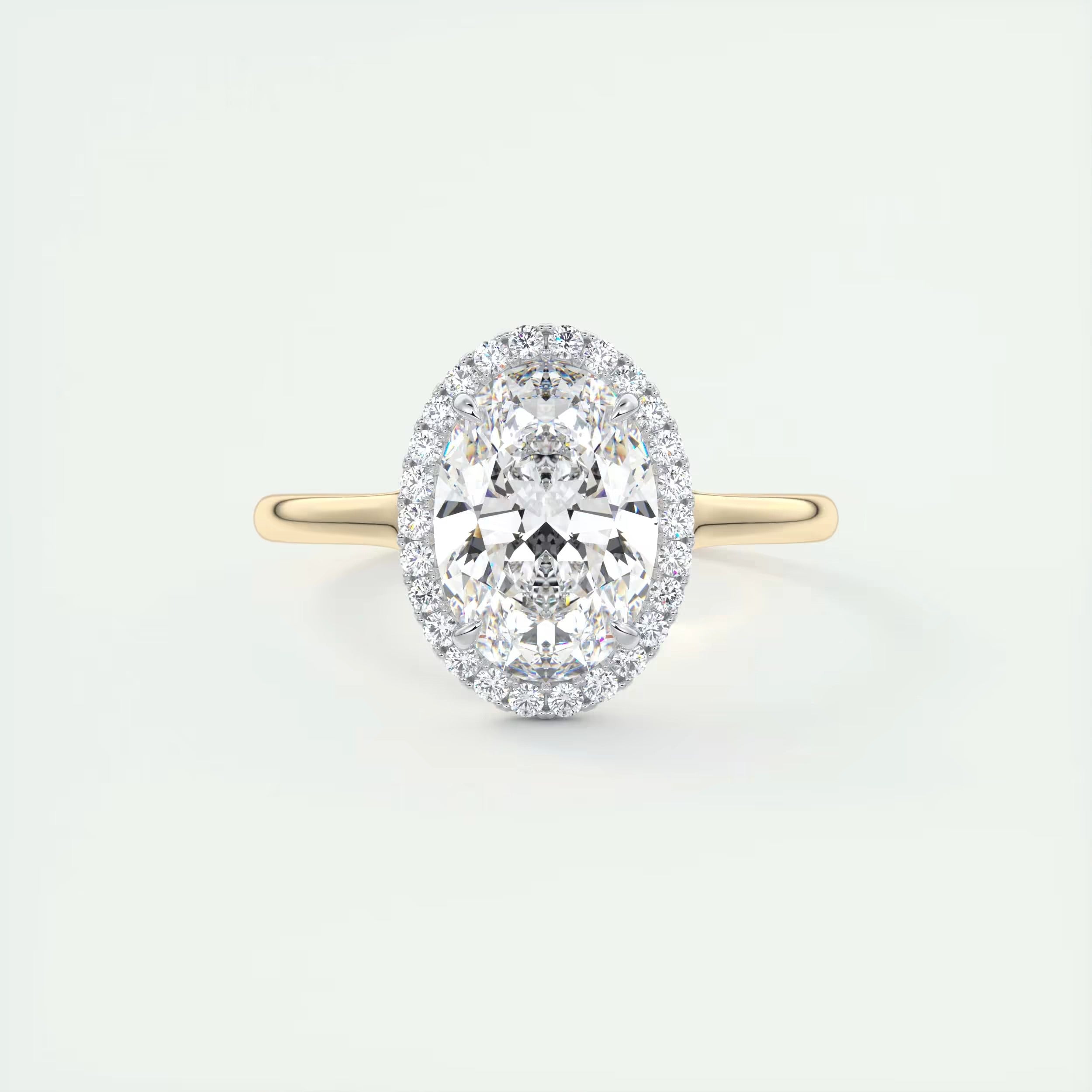 2.10 Ct The Breezy Halo Oval Center with French Set Halo Ring