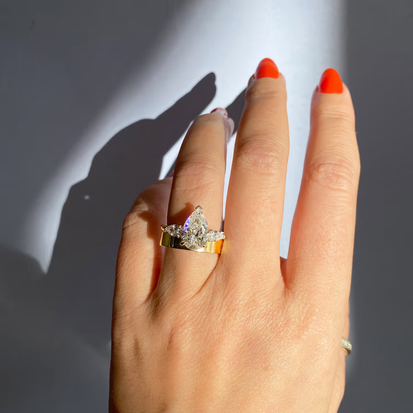 2.50 Ct Breezy Pears - Flush Stacking Pear Three Stone Solitaire Side Stone Rings