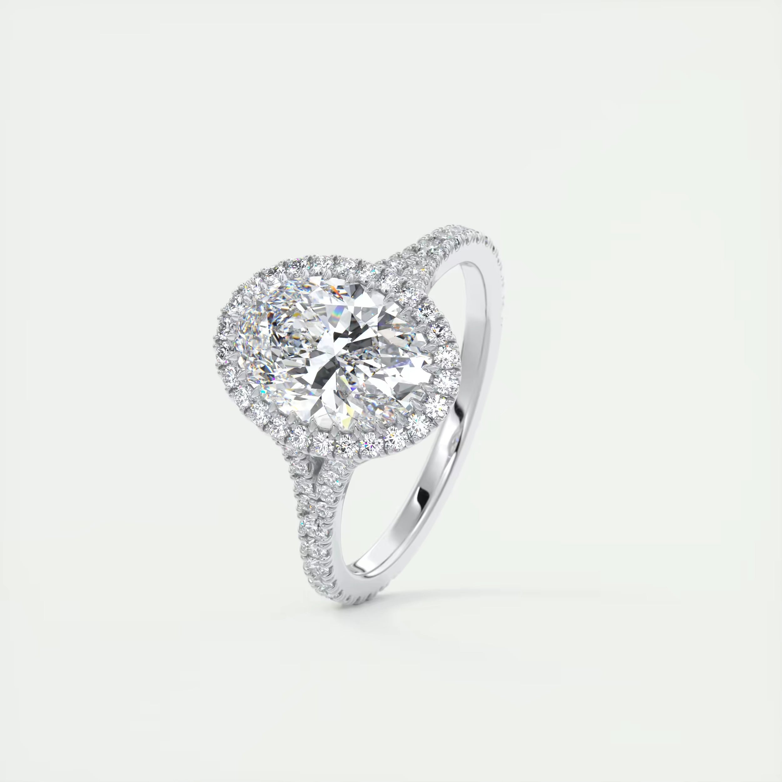 2.60 Ct The French Halo Oval Cut Diamond with Miniature Prongs Ring