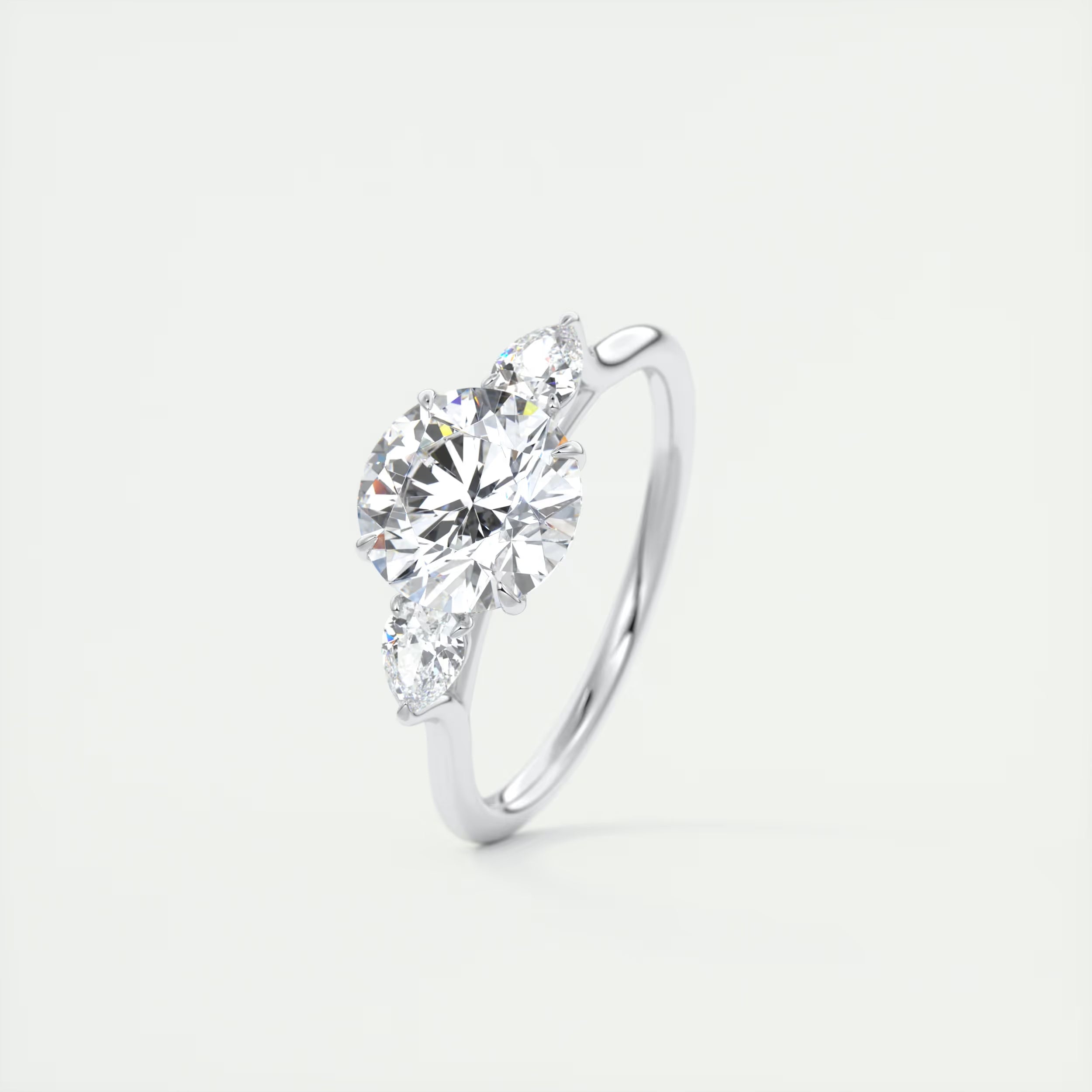 2.50 Ct Breezy Center Stone Round & Side Stone Pear Flush Stacking Three Stone Engagement Ring