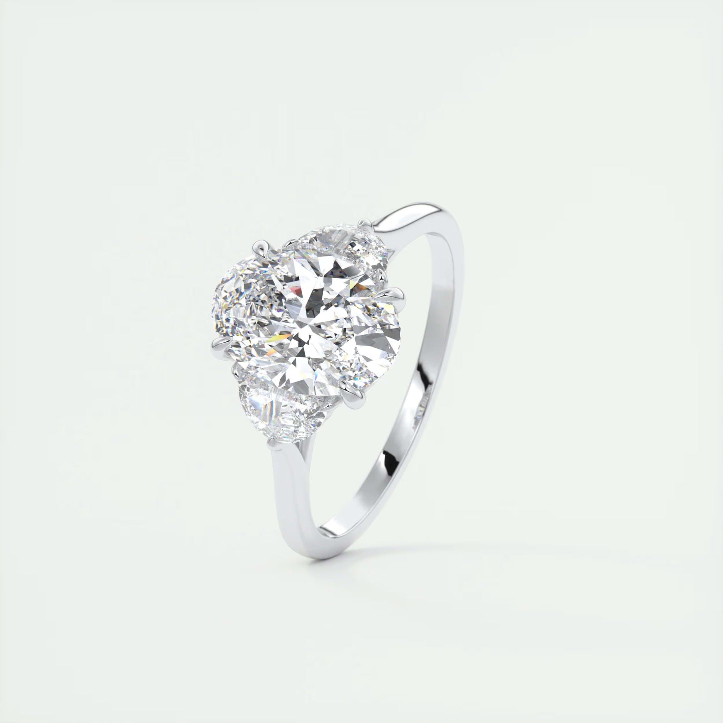 3.00 Ct The Nouveau Oval - Oval Half Moon Three Stone Engagement Rings