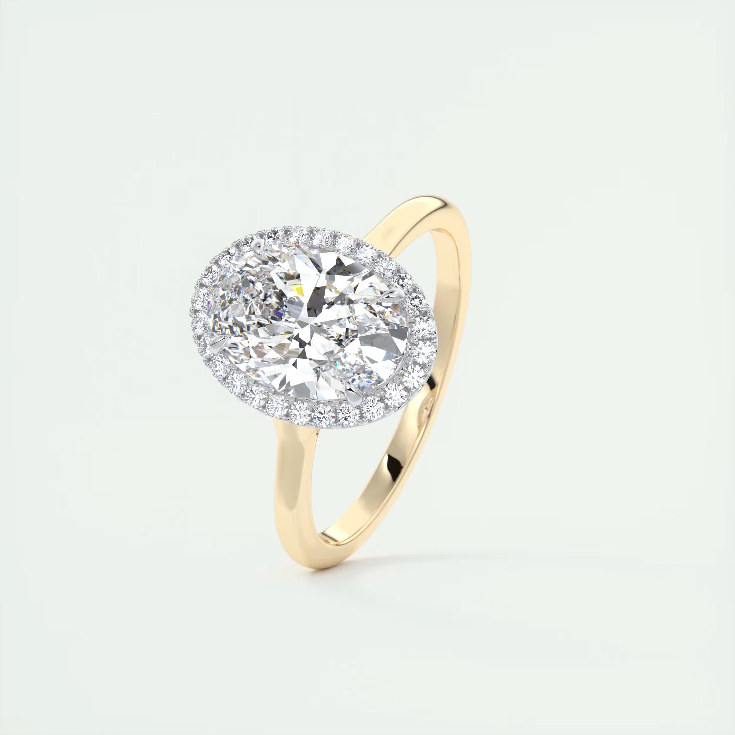 2.10 Ct The Breezy Halo Oval Center with French Set Halo Ring