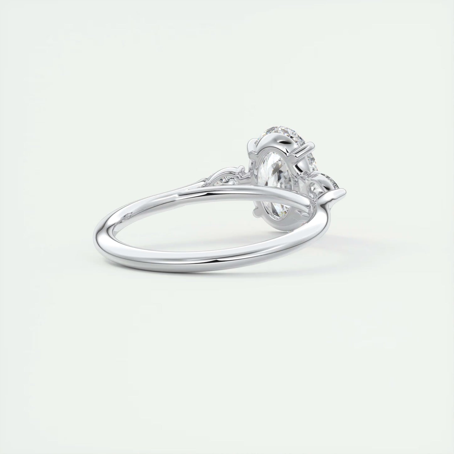 2.50 Ct Breezy Pears Oval Solitaire Side Stone Rings