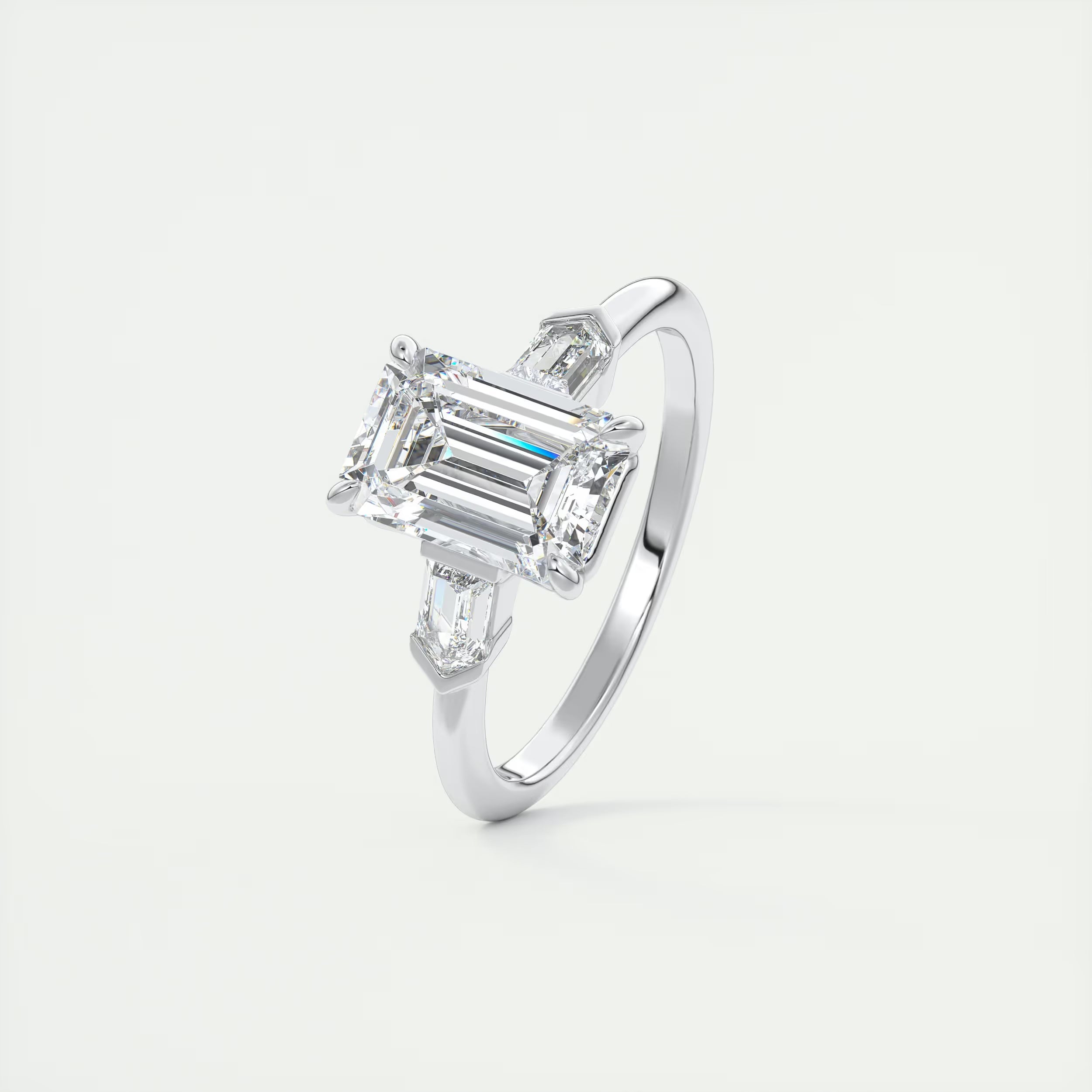 2.30 Ct Center Stone Emerald & Side Stone Bullets Three Stone Engagement Rings