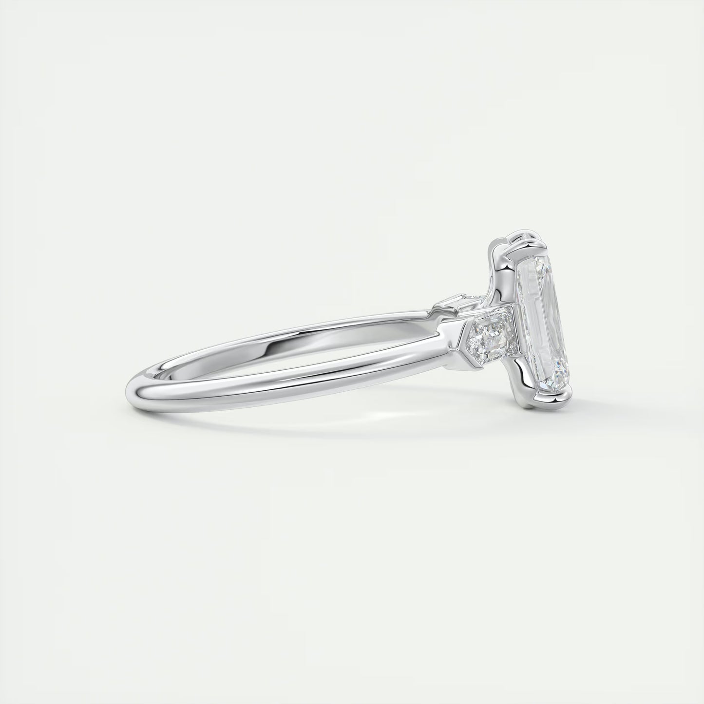 2.30 Ct Plunge Emerald & Bullets Three Stone Engagement Rings