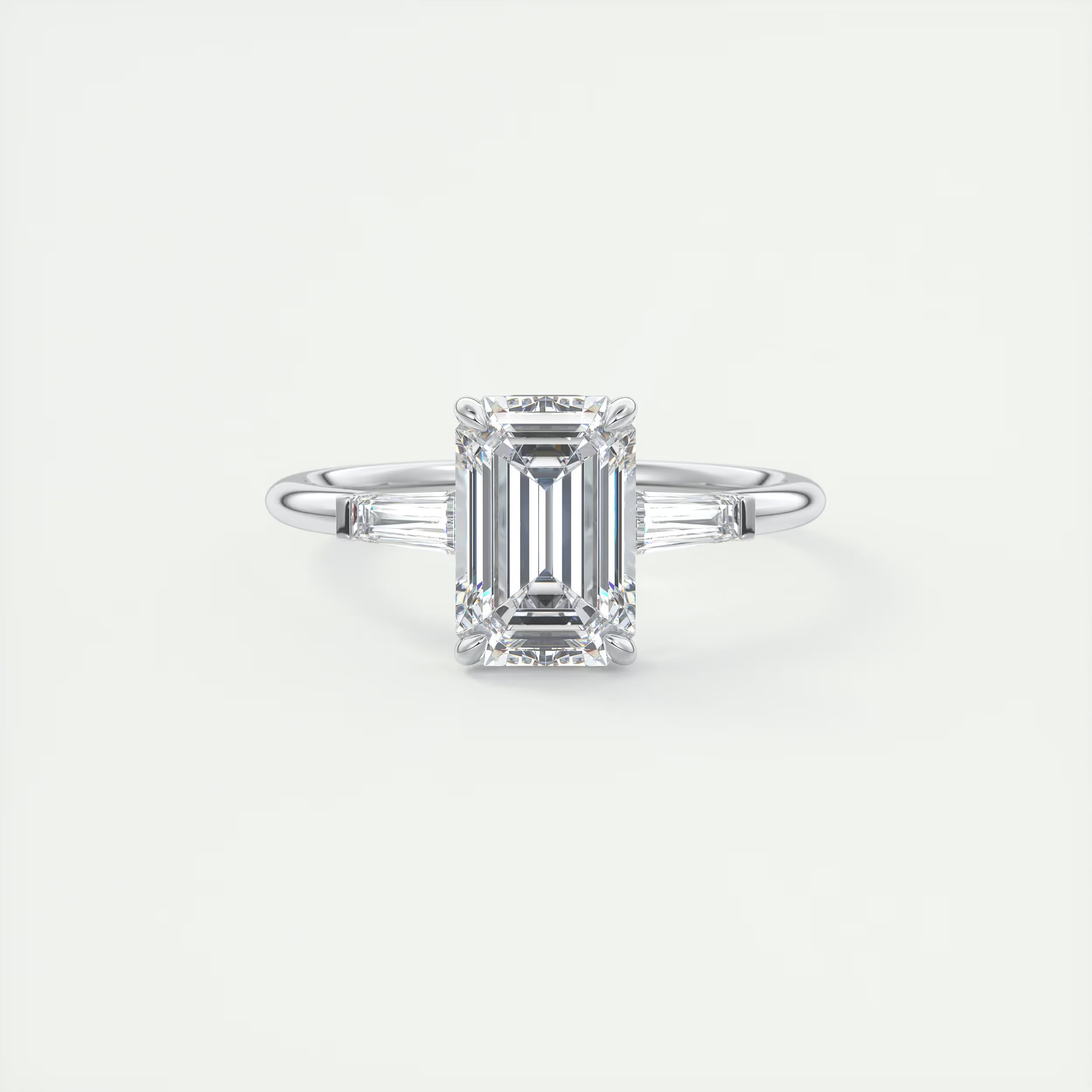 2.15 Ct Center Stone Emerald Plunge Three Stone Engagement Rings