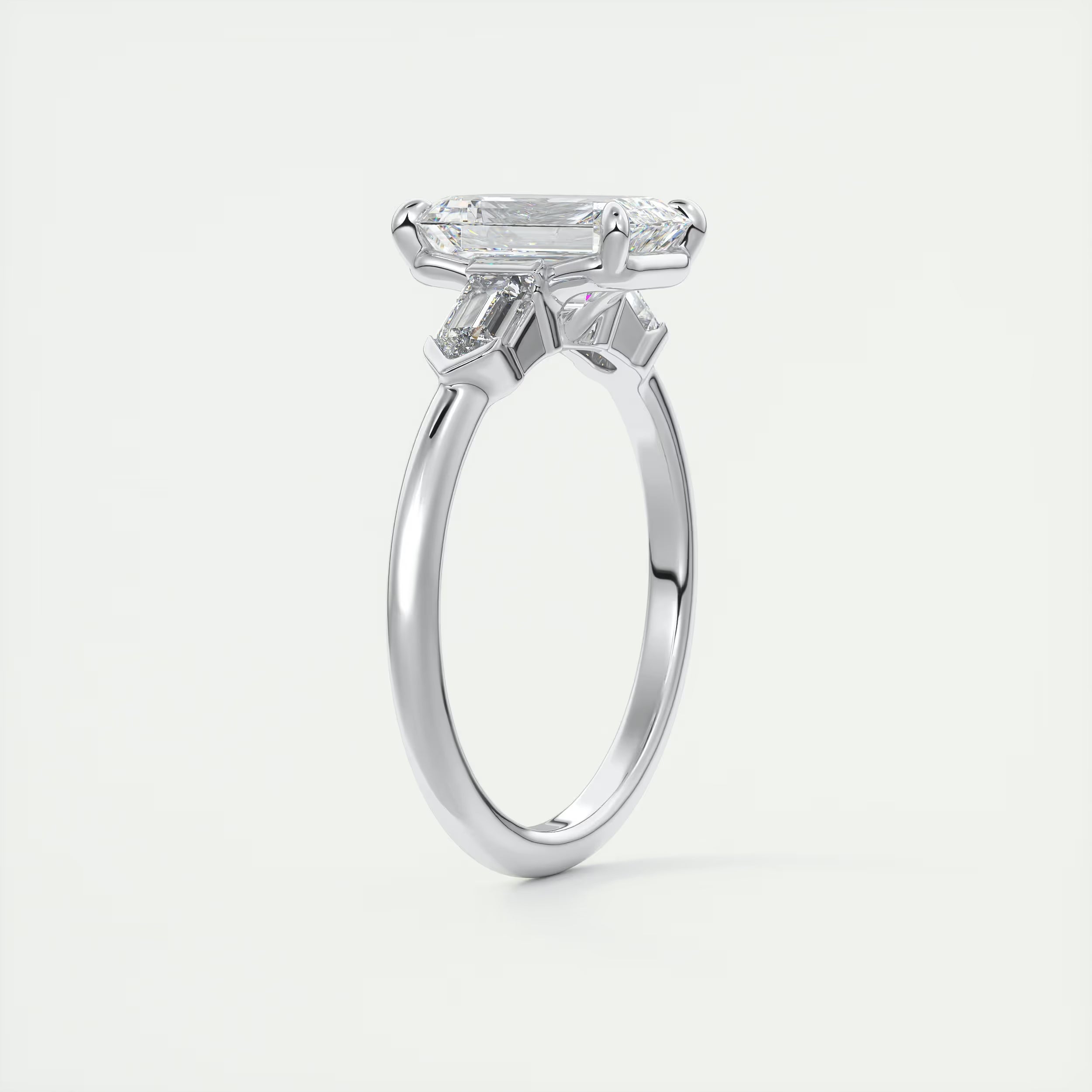 2.30 Ct Center Stone Emerald & Side Stone Bullets Three Stone Engagement Rings