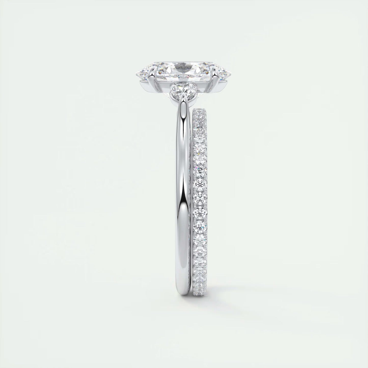 2.50 Ct Breezy Pears Oval Solitaire Side Stone Rings