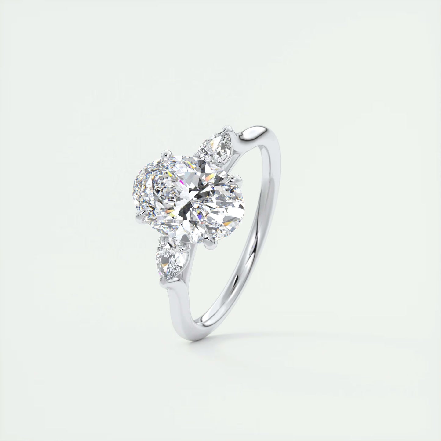 2.50 Ct Breezy Pears Oval Solitaire Side Stone Rings
